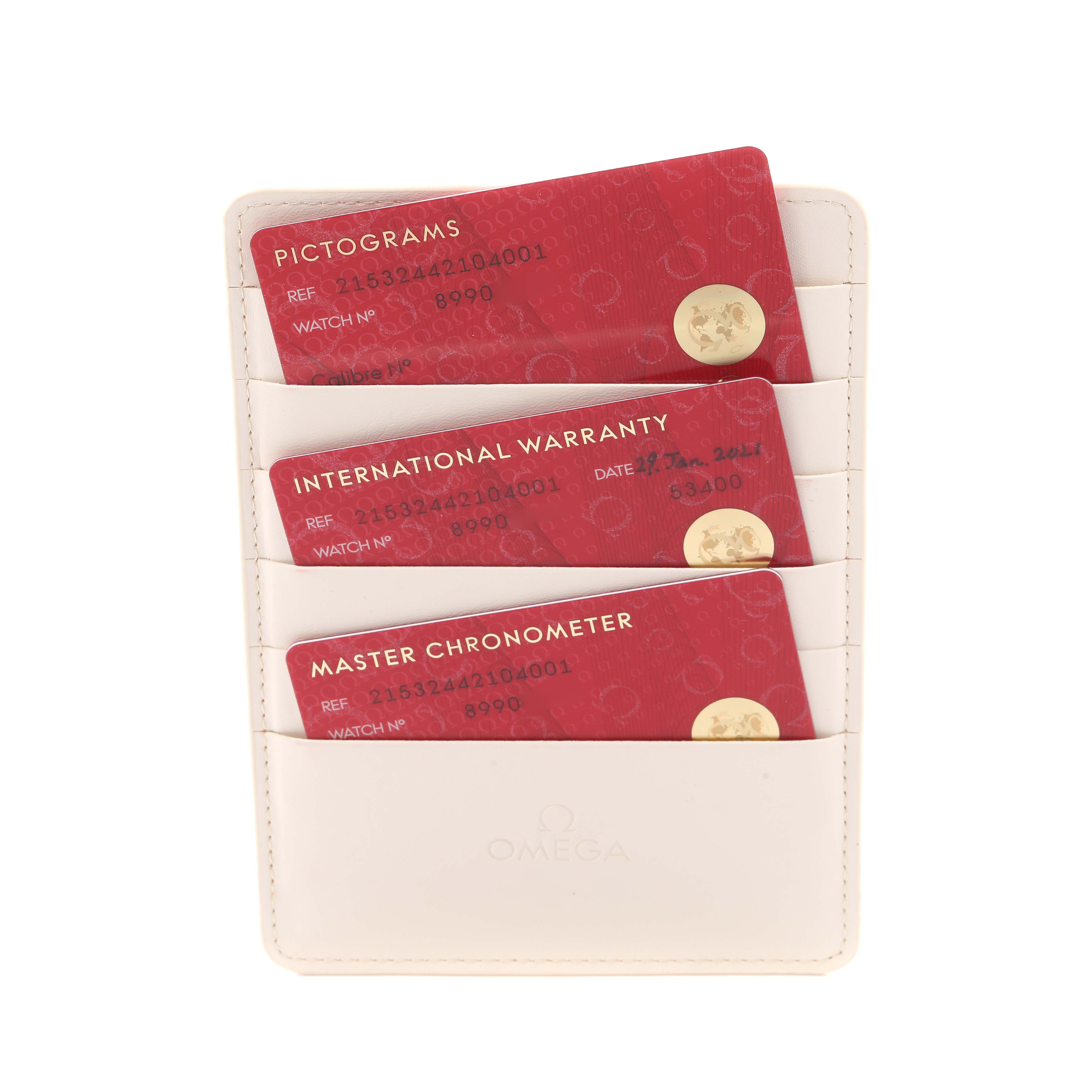 The image shows three cards labeled "Pictograms," "International Warranty," and "Master Chronometer" for an Omega Planet Ocean 215.32.44.21.04.001 Men
s Stainless Steel White Dial 215.32.44.21.04.001 Men
s Stainless Steel White Dial, in a card holder.