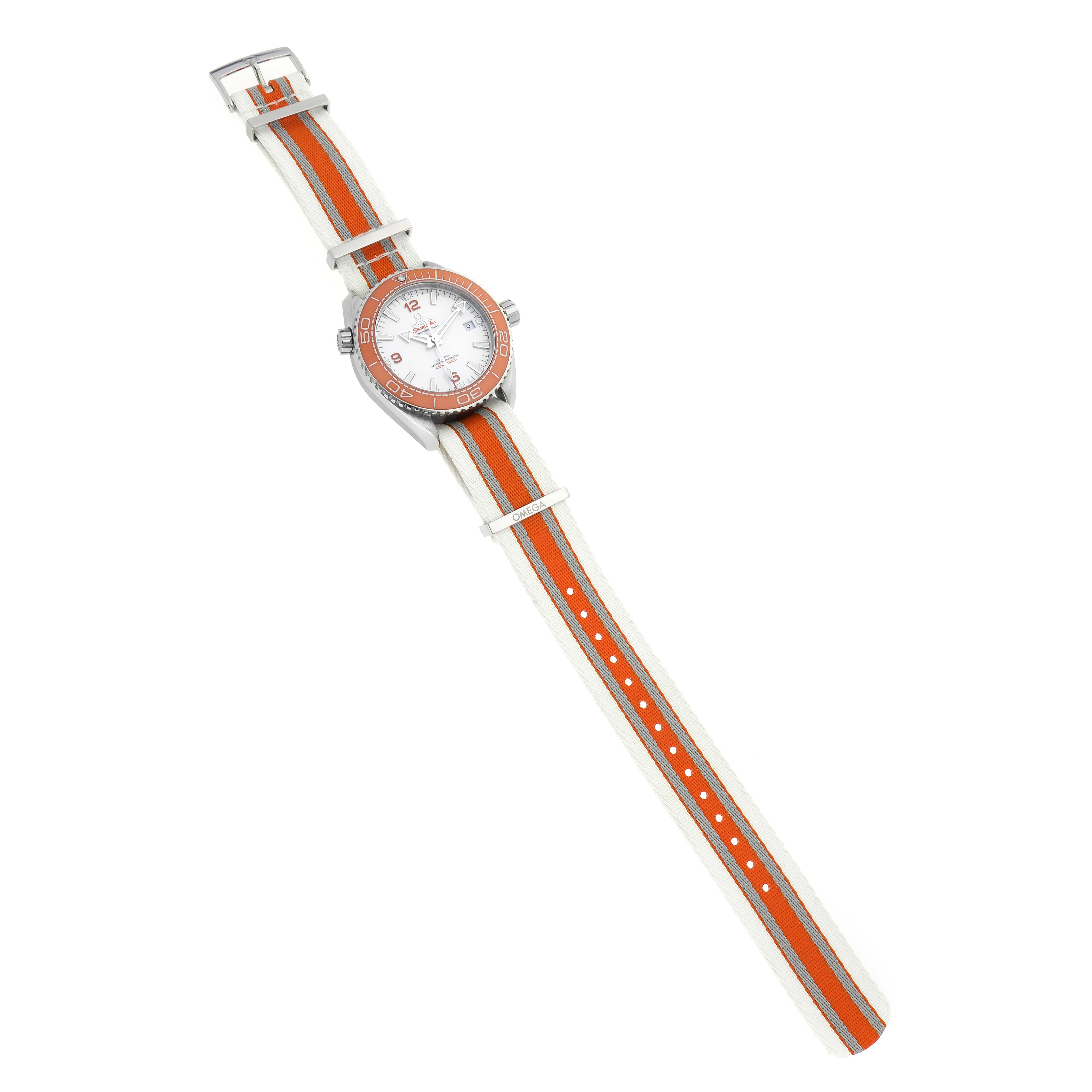 The Omega Planet Ocean 215.32.44.21.04.001 Men
s Stainless Steel White Dial 215.32.44.21.04.001 Men
s Stainless Steel White Dial watch is shown from an overhead angle, highlighting the face and multicolored NATO strap.