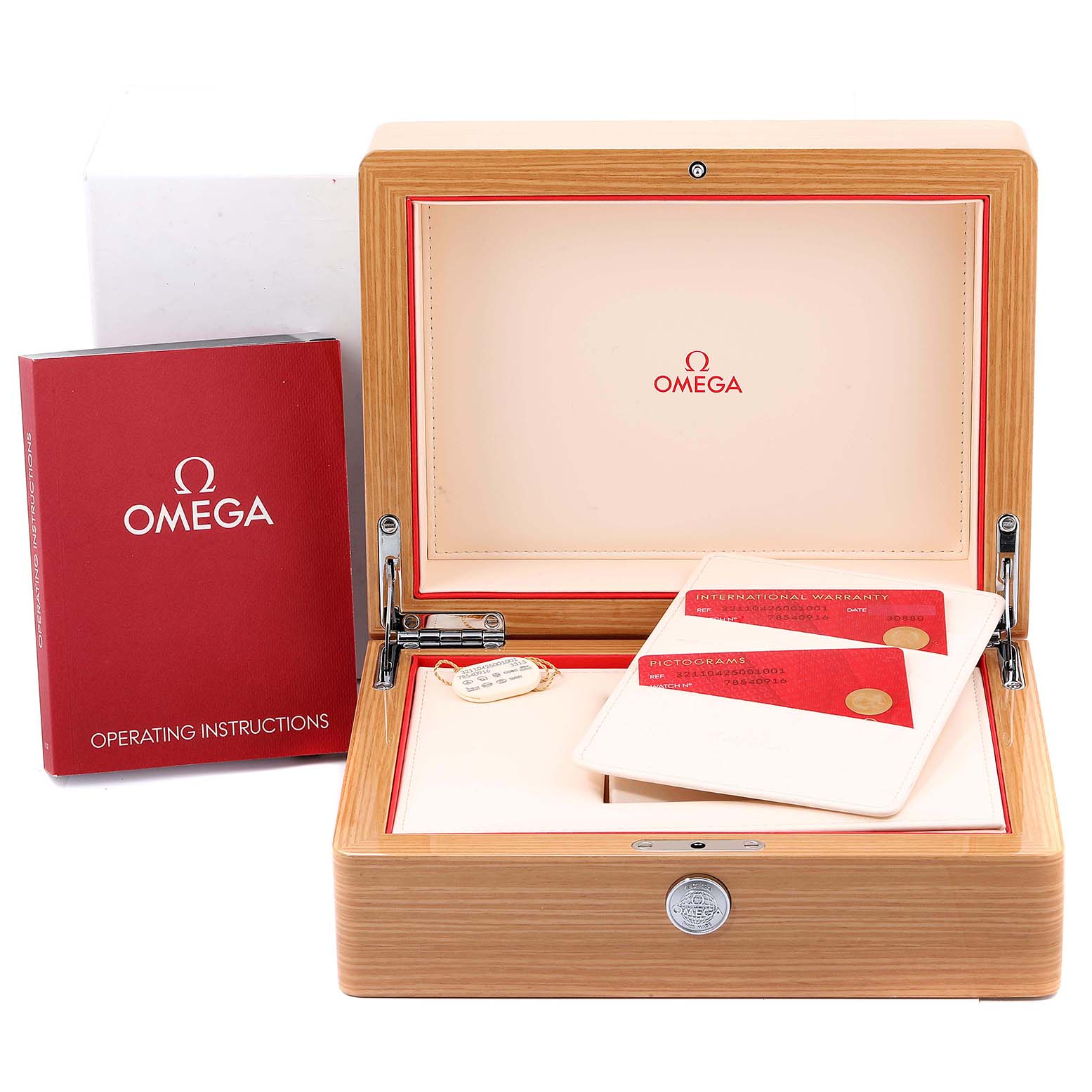 The image shows an open Omega Speedmaster 321.10.42.50.01.001 Men
s Stainless Steel Black Dial 321.10.42.50.01.001 Men
s Stainless Steel Black Dial watch box with operating instructions and warranty cards.
