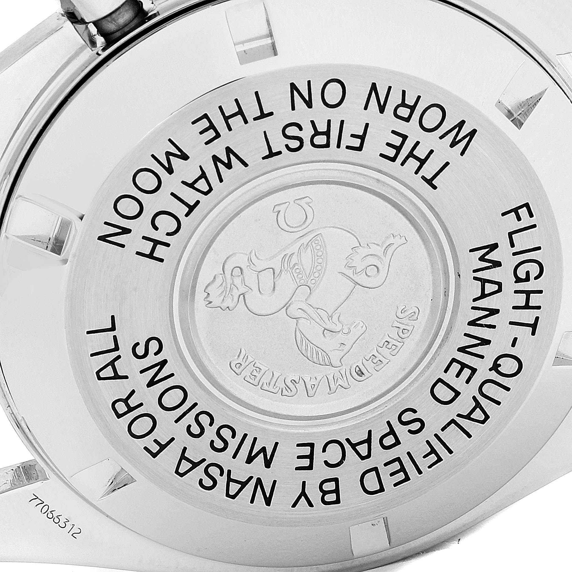 The image shows the back case of an Omega Speedmaster 3570.50.00 Men
s Stainless Steel Black Dial 3570.50.00 Men
s Stainless Steel Black Dial watch with engraved text and logo.