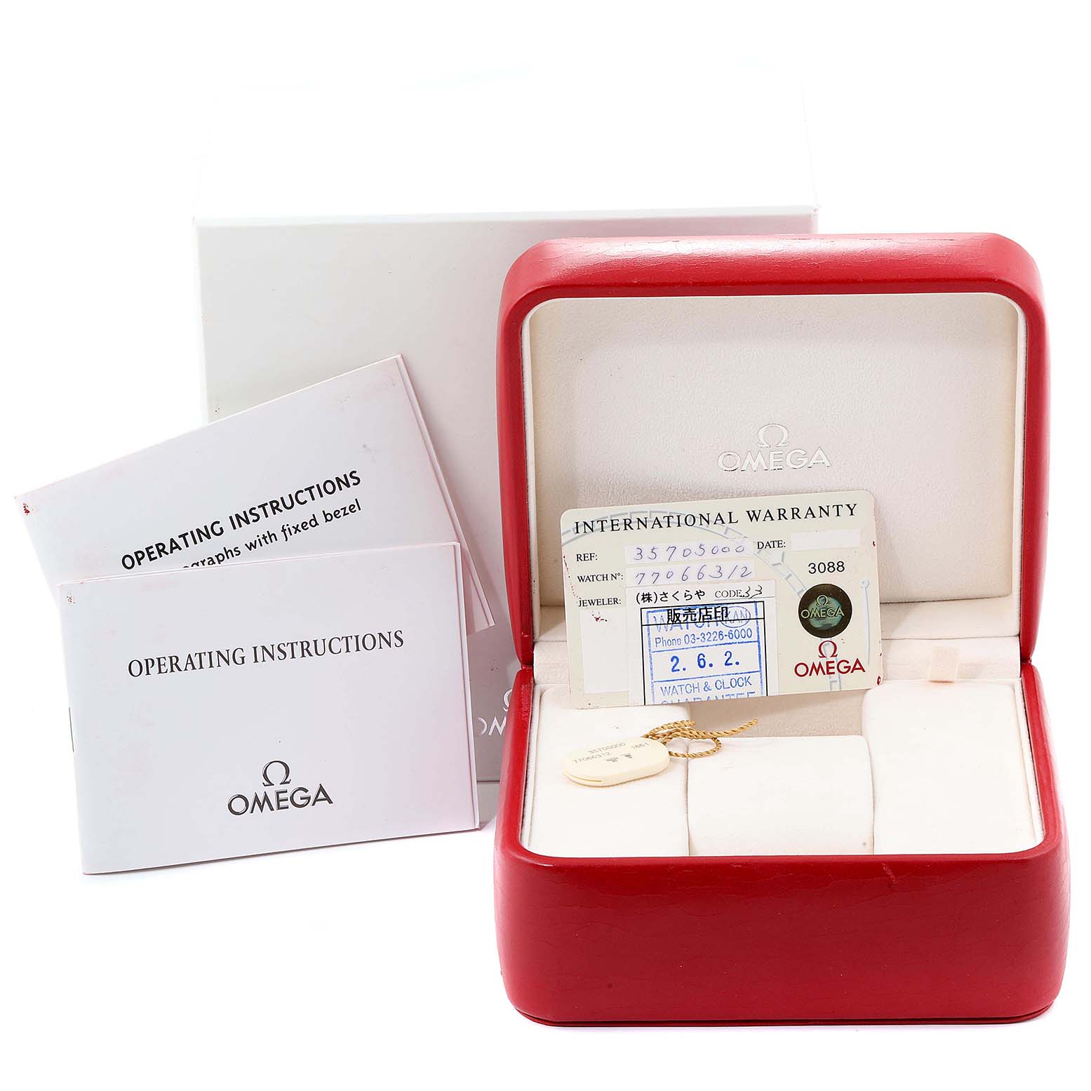 The image shows an Omega Speedmaster 3570.50.00 Men
s Stainless Steel Black Dial 3570.50.00 Men
s Stainless Steel Black Dial watch box, warranty card, instruction manuals, and packaging.