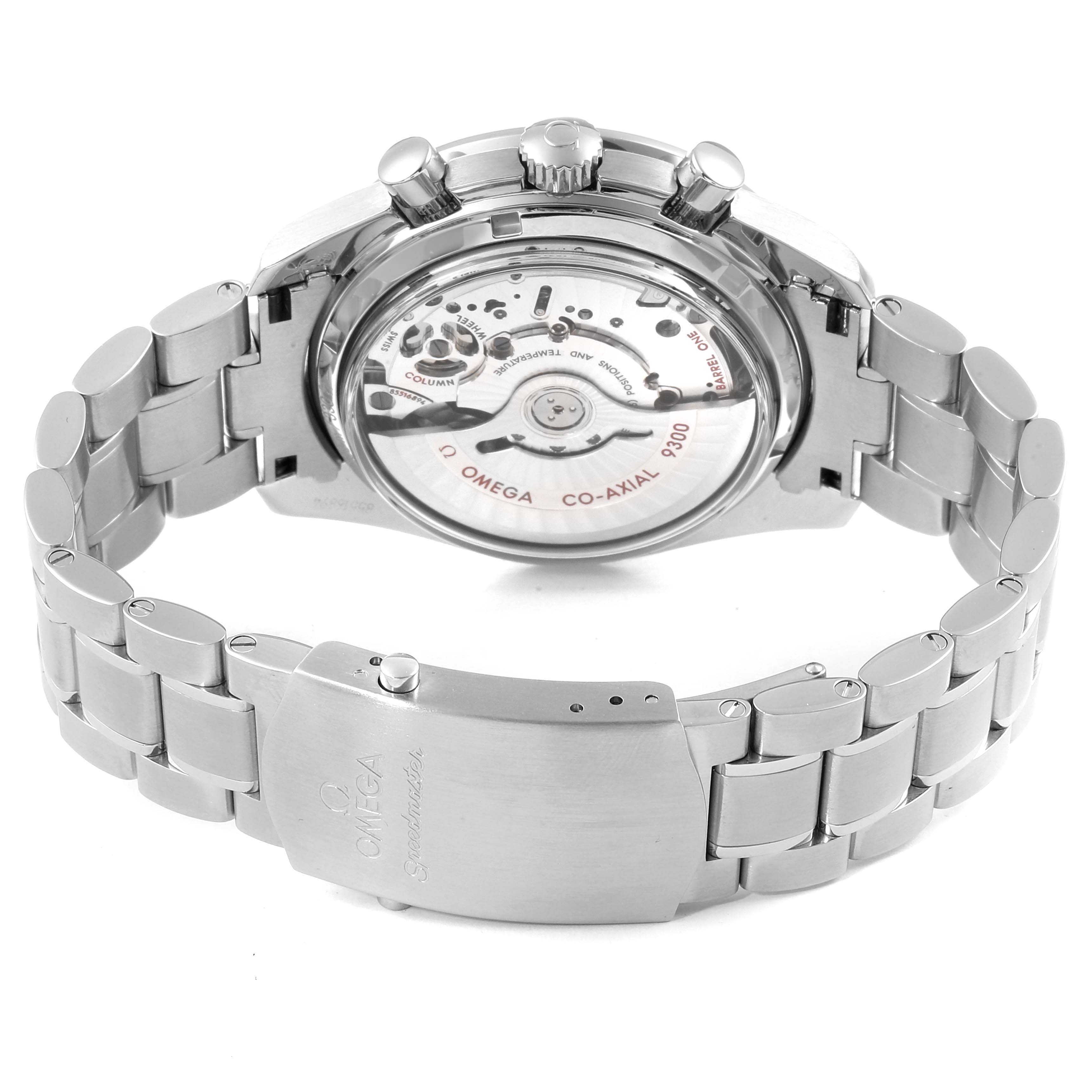 The image shows the back view of an Omega Speedmaster 311.30.44.51.01.002 Men
s Stainless Steel Black Dial 311.30.44.51.01.002 Men
s Stainless Steel Black Dial watch, highlighting its movement and stainless steel bracelet.