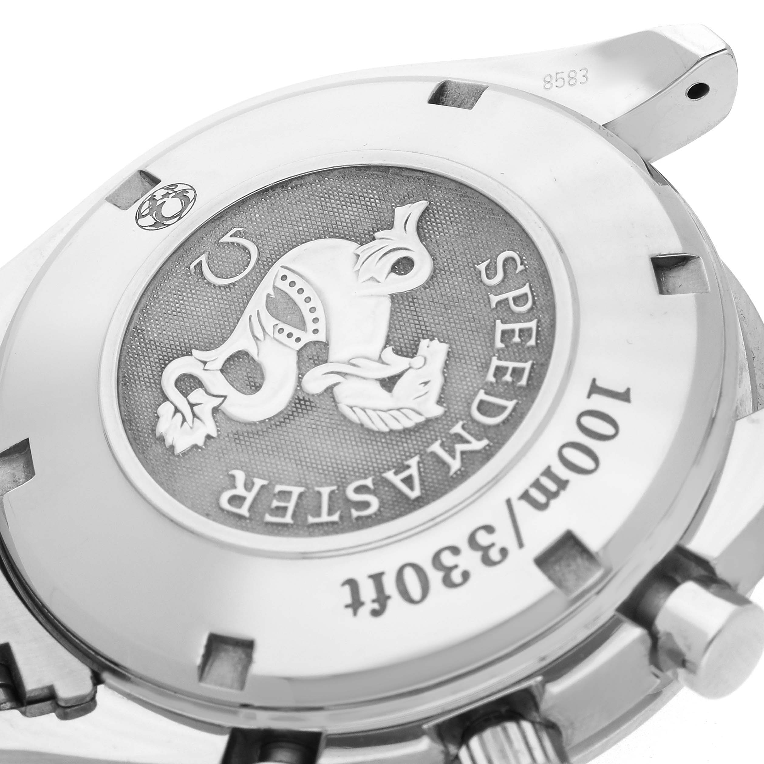 The image shows the Omega Speedmaster 3222.80.00 Men's Stainless Steel Blue Dial 3222.80.00 Men's Stainless Steel Blue Dial case back at an angled view, highlighting its engraved emblem and water resistance marking.