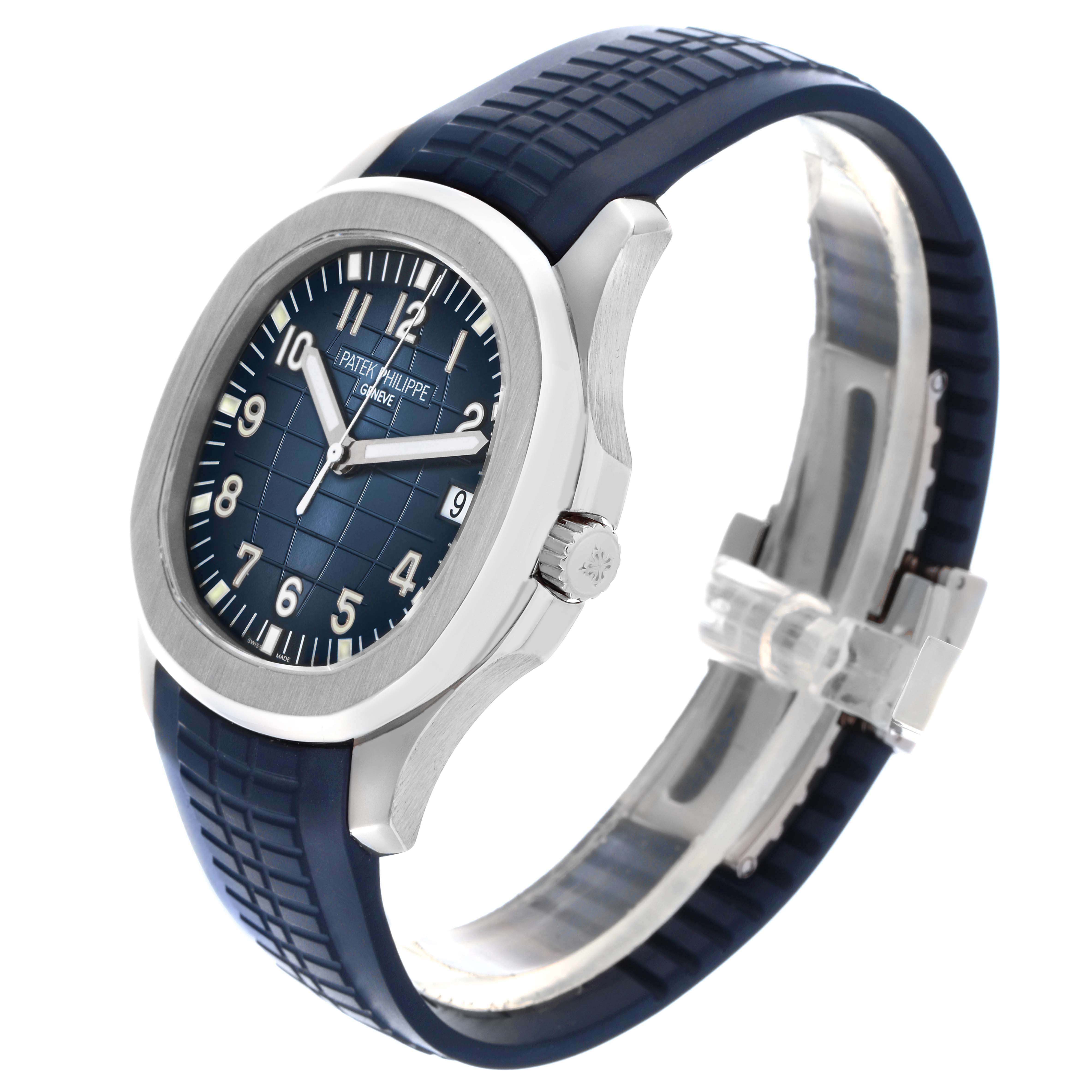 The Patek Philippe Aquanaut 5168G-001 Men's White Gold Blue Dial 5168G-001 Men's White Gold Blue Dial watch is shown at an angle displaying the face, bezel, blue strap, and partial clasp.