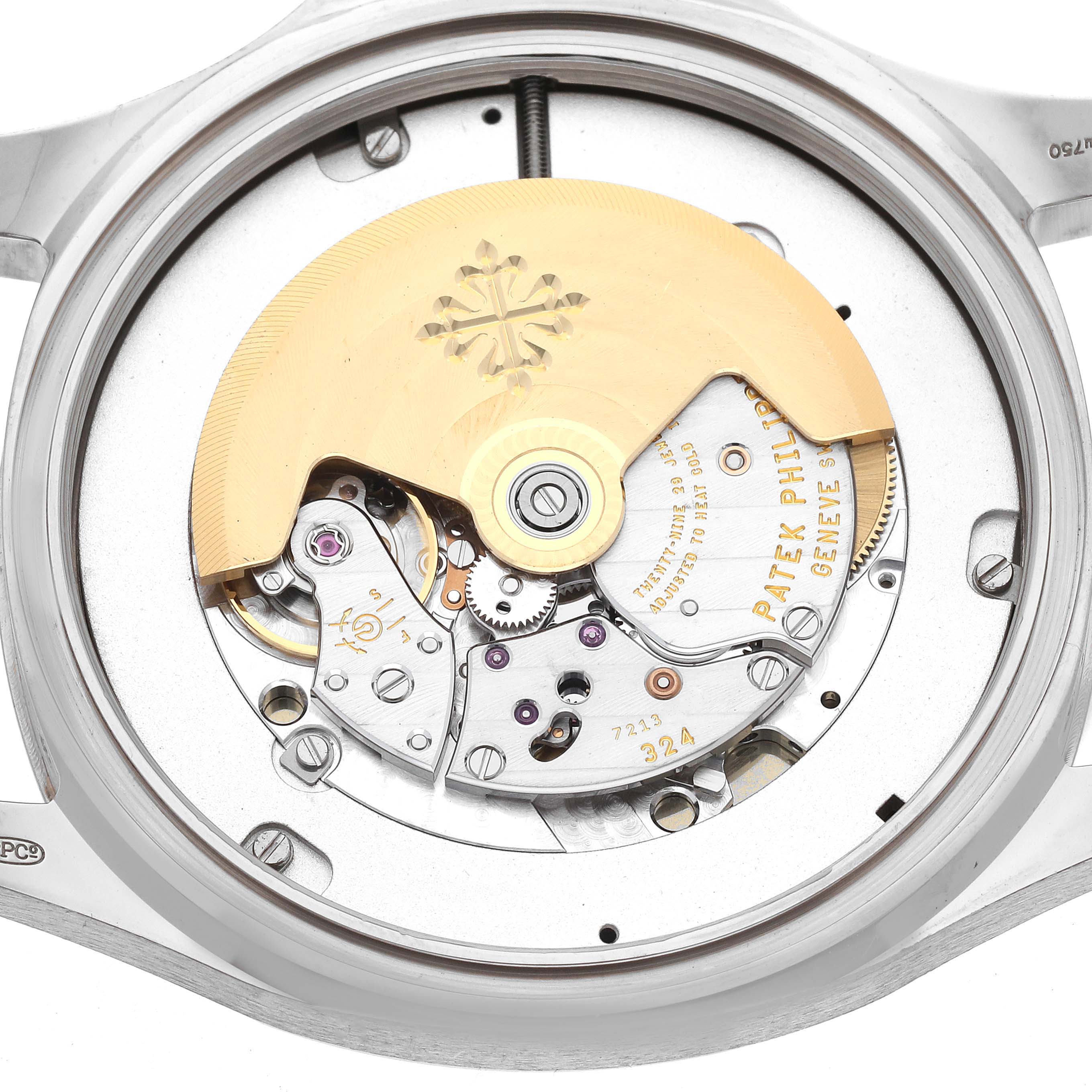 The image shows the movement mechanism of the Patek Philippe Aquanaut 5168G-001 Men's White Gold Blue Dial 5168G-001 Men's White Gold Blue Dial watch from a rear angle, highlighting the rotor and internal gears.