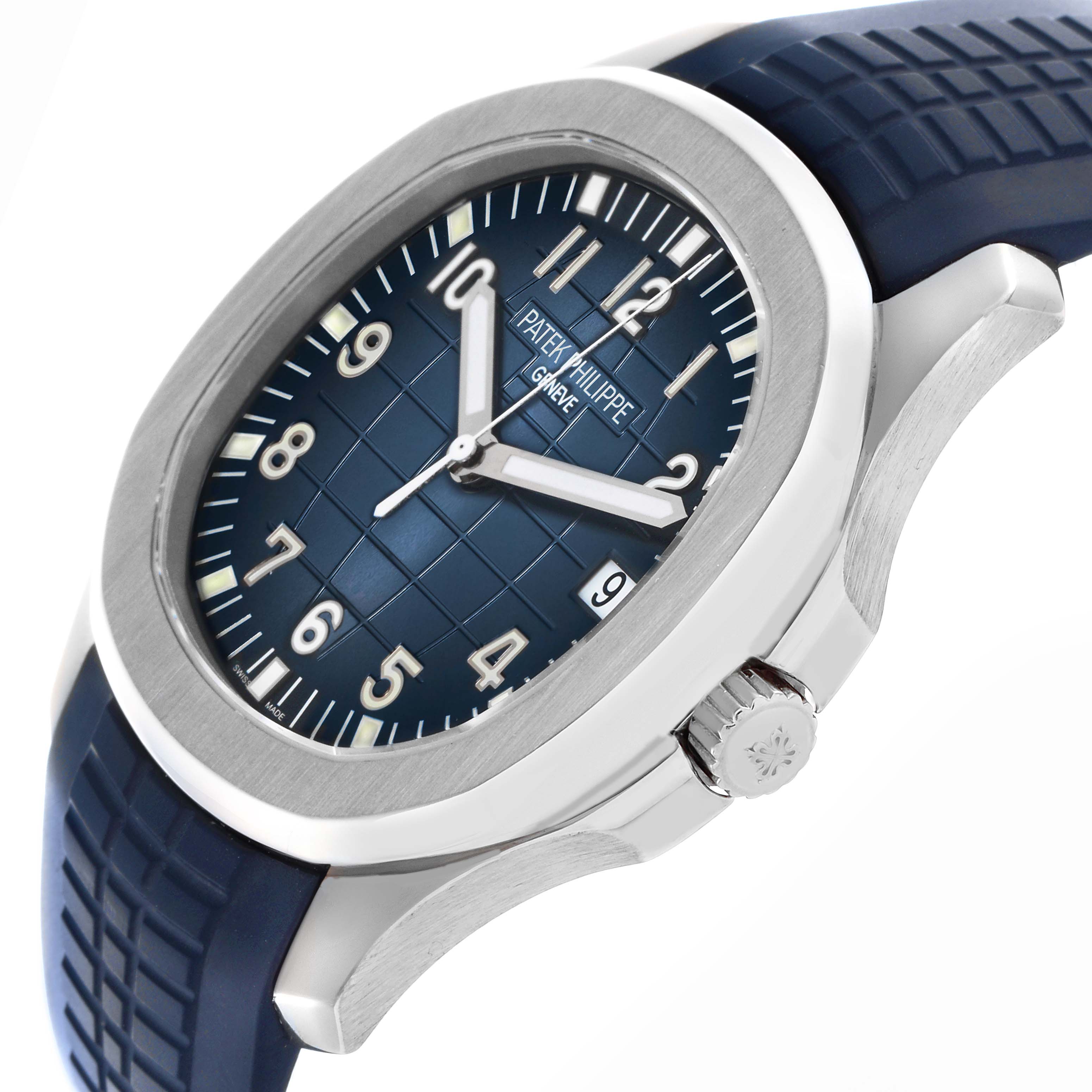 The image shows a side angle of the Patek Philippe Aquanaut 5168G-001 Men's White Gold Blue Dial 5168G-001 Men's White Gold Blue Dial, highlighting the dial, bezel, crown, and strap.