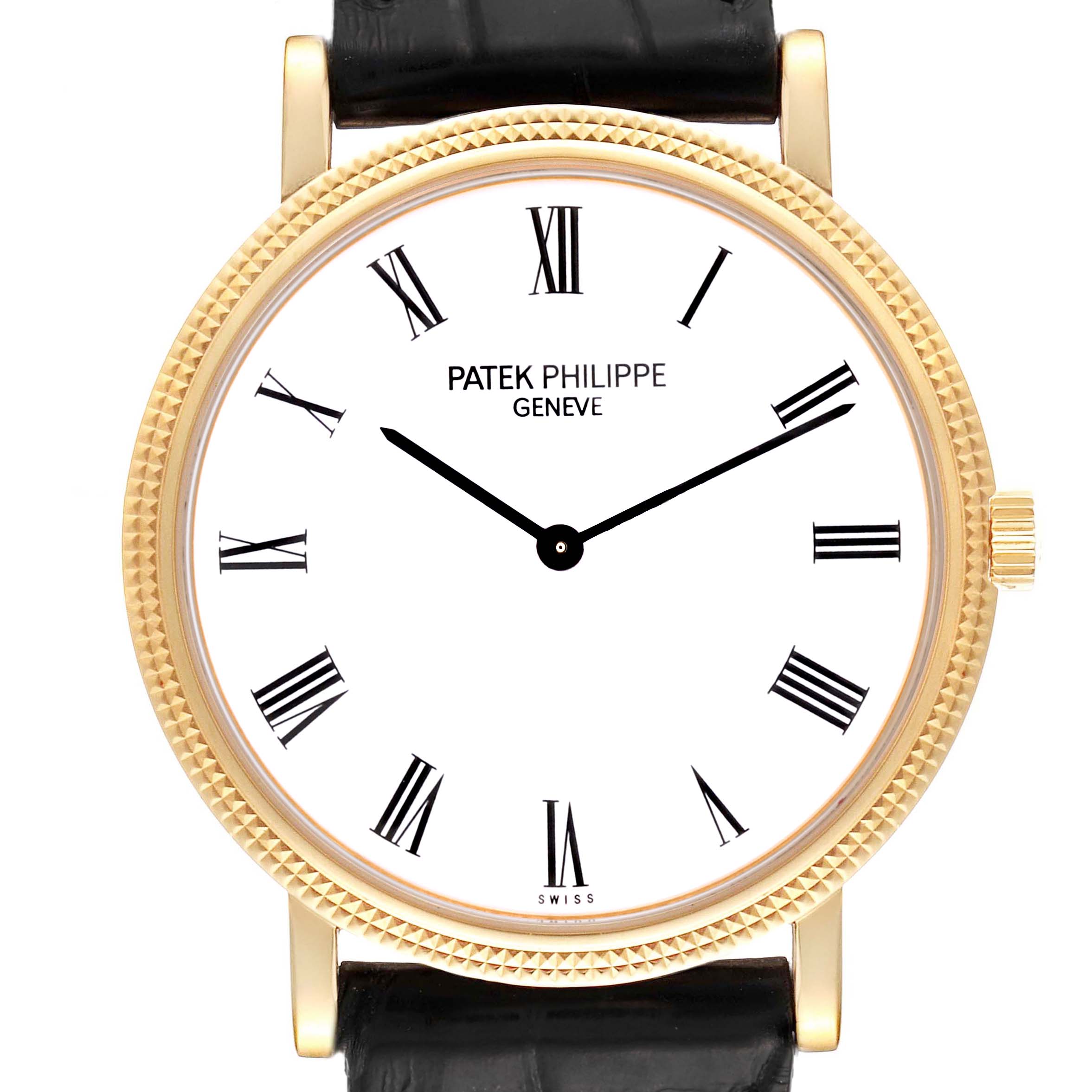 The image shows a front angle of a Patek Philippe Calatrava 5120J Men
s Yellow Gold White Dial 5120J Men
s Yellow Gold White Dial watch, highlighting the dial, hands, and part of the strap.