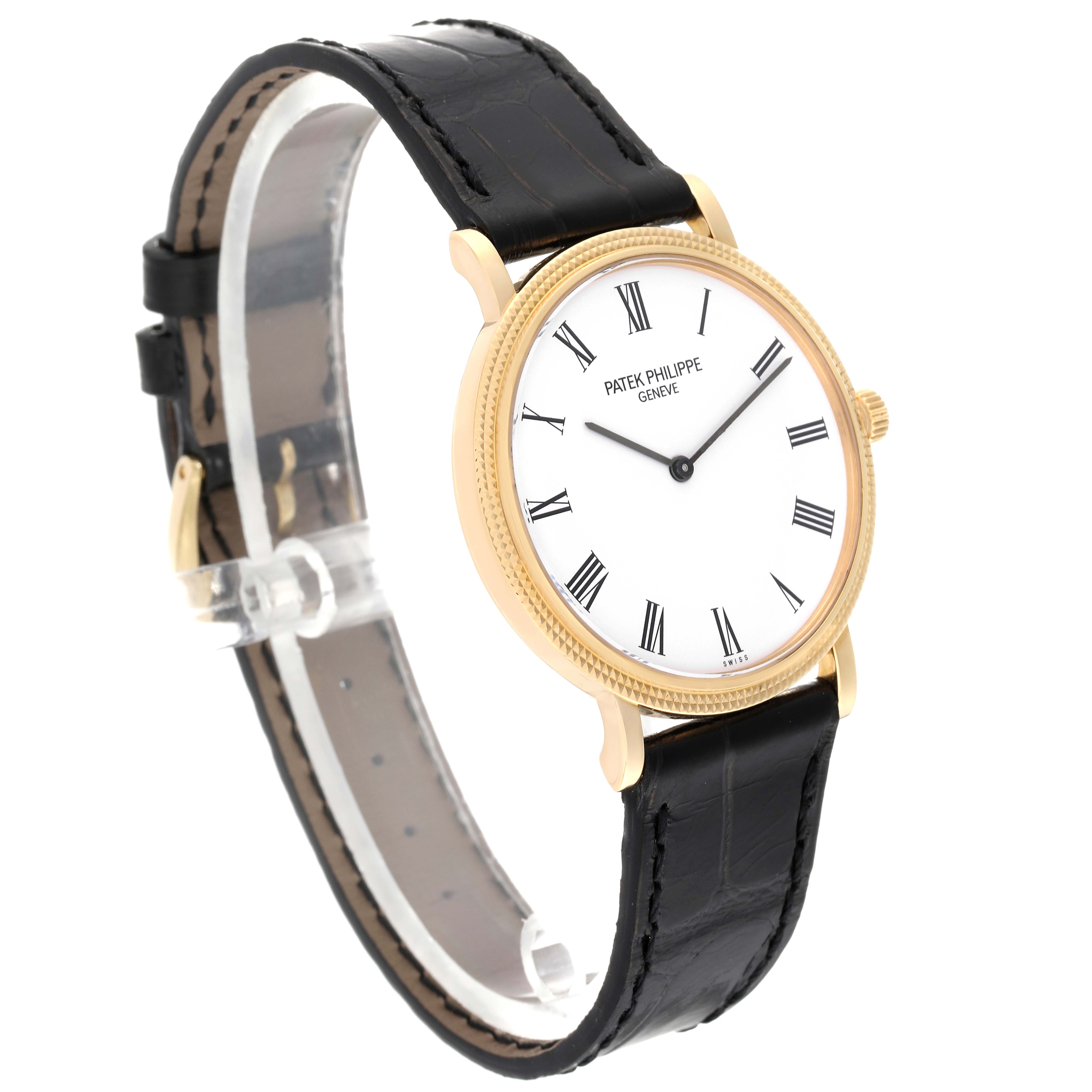 The image shows the Patek Philippe Calatrava 5120J Men
s Yellow Gold White Dial 5120J Men
s Yellow Gold White Dial watch angled slightly from the front and side, highlighting its face, bezel, and strap.