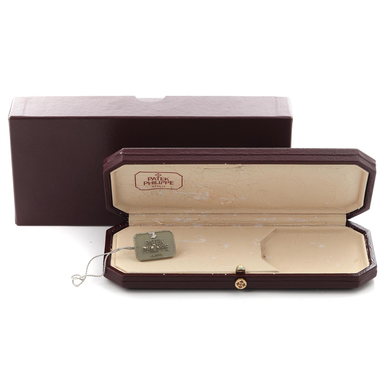 The image shows an open Patek Philippe Calatrava 3796J Men
s Yellow Gold White Dial 3796J Men
s Yellow Gold White Dial watch box with a tag inside, viewed from the front.