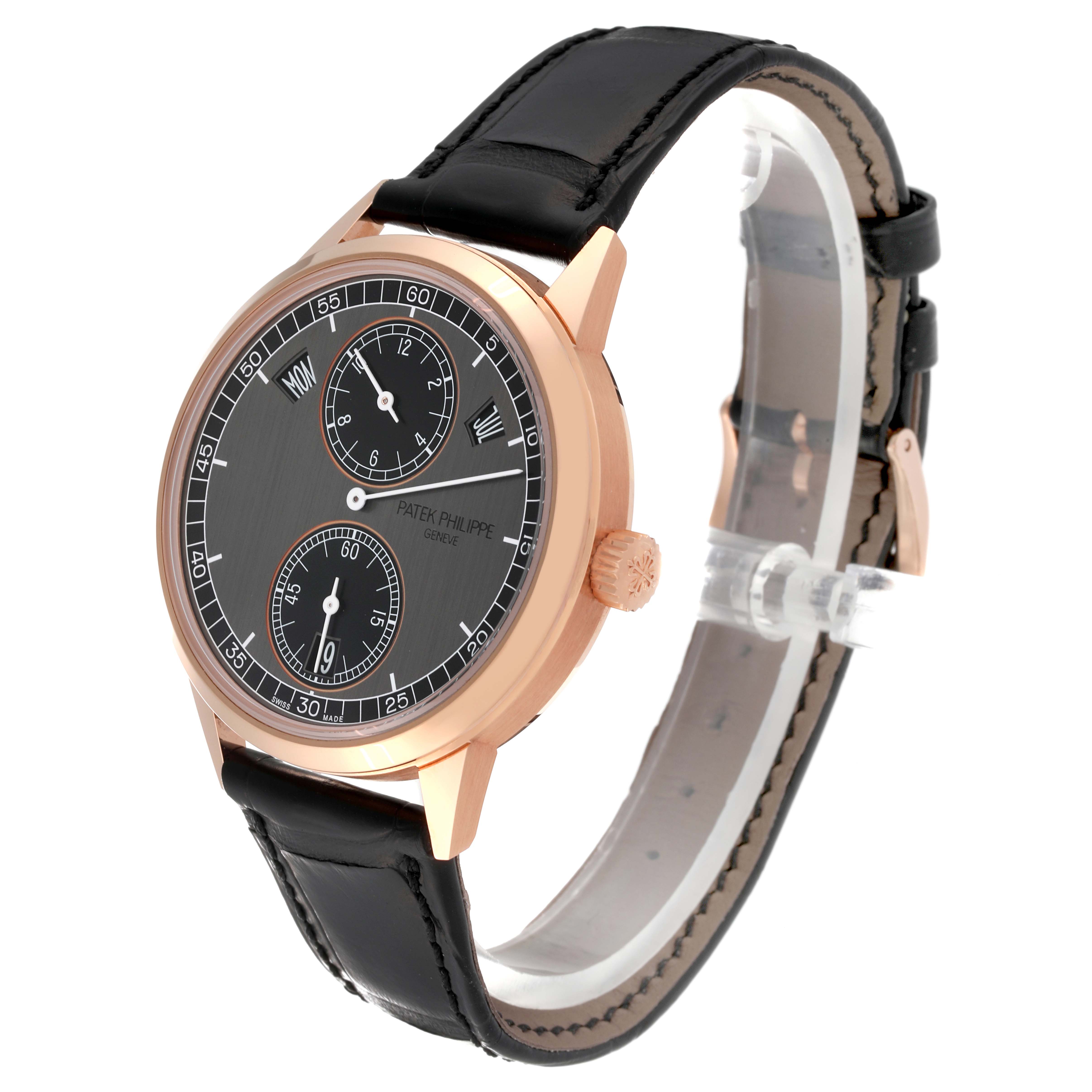 This Patek Philippe Complications 5235/50R-001 Men's Rose Gold Black Dial 5235/50R-001 Men's Rose Gold Black Dial model watch is shown at an angle displaying the full face, case, and leather strap.