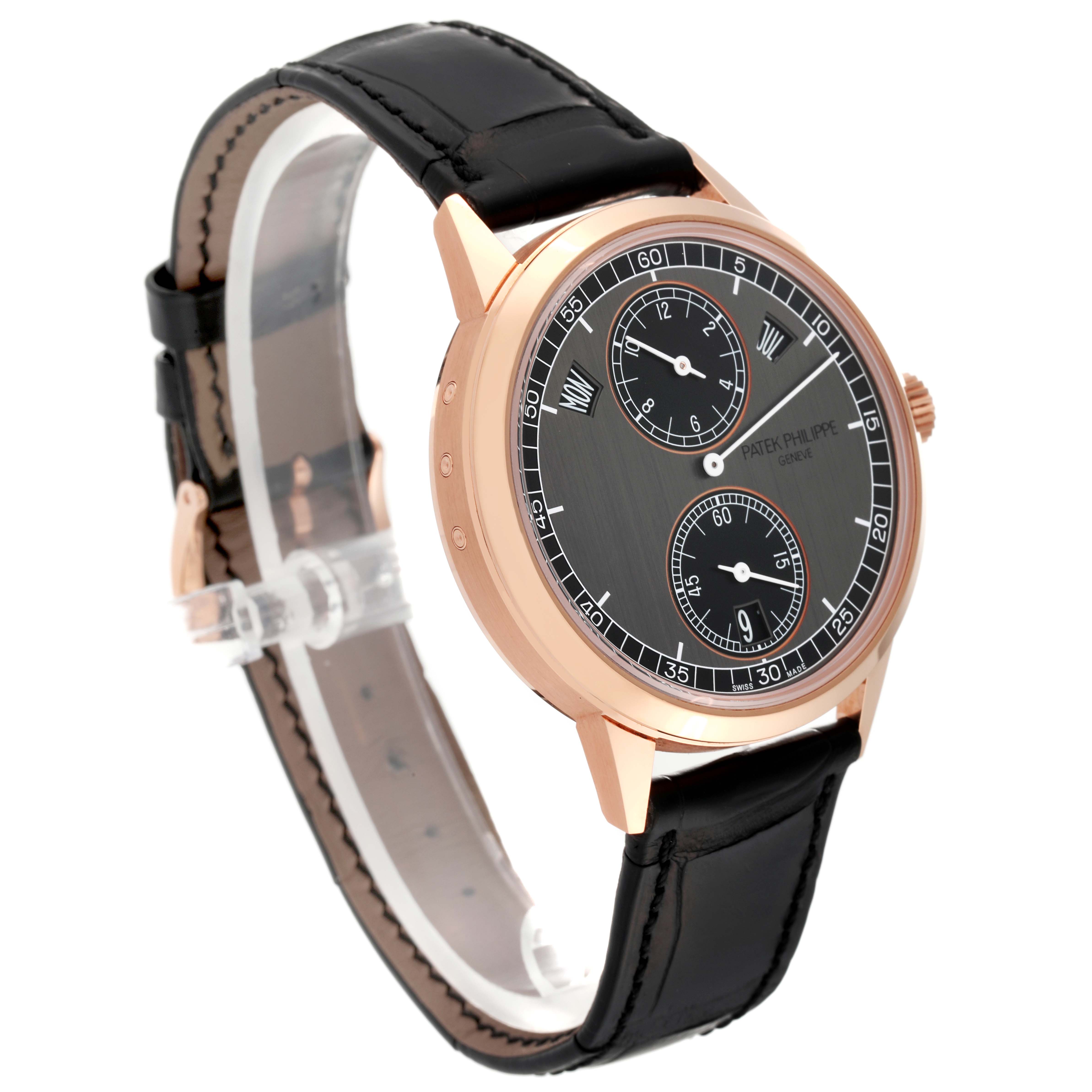 This Complications model by Patek Philippe is shown from a front angle, displaying its face, dial, and black leather strap.