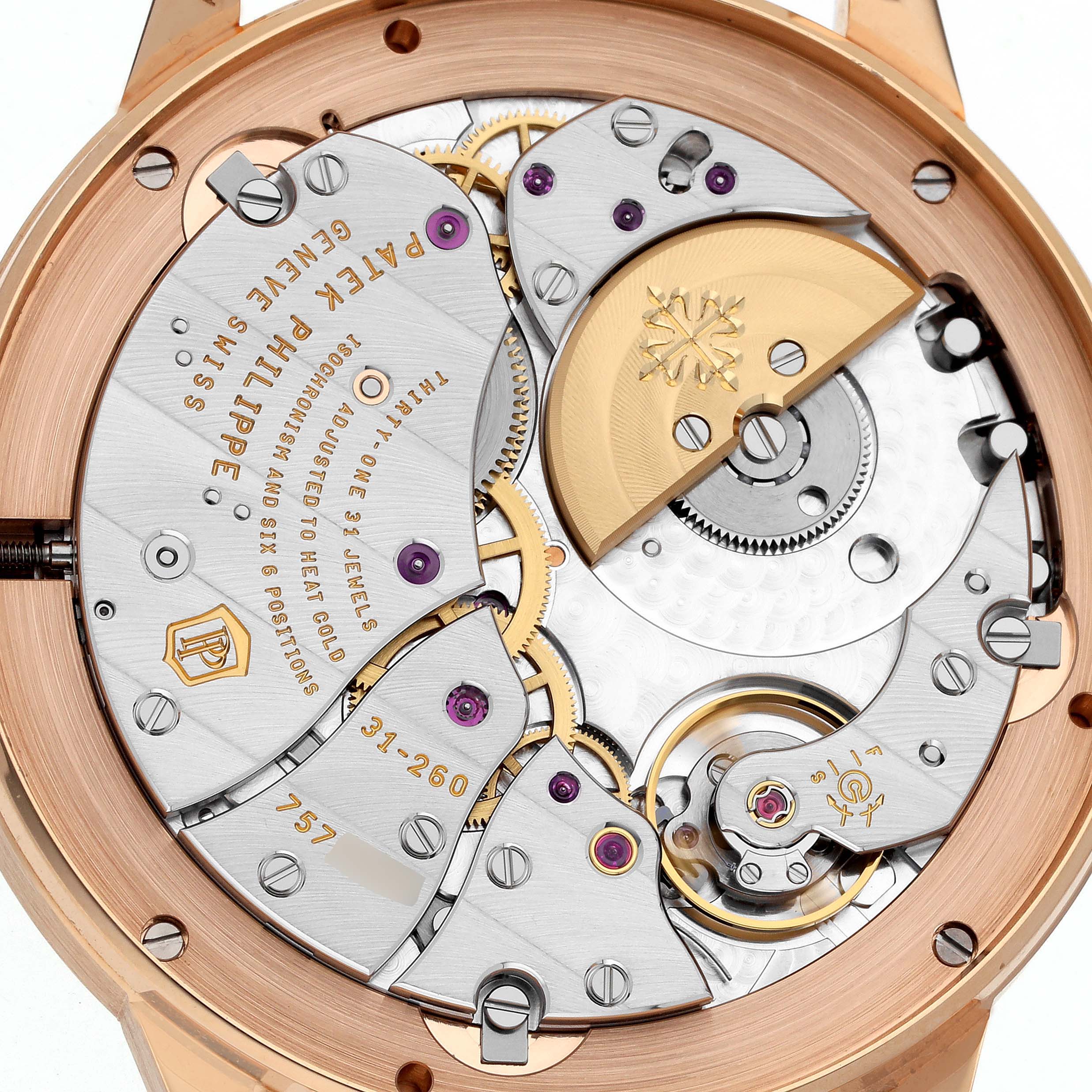 The image shows the back view of the Patek Philippe Complications 5235/50R-001 Men's Rose Gold Black Dial 5235/50R-001 Men's Rose Gold Black Dial model, highlighting its intricate movement and internal mechanisms.