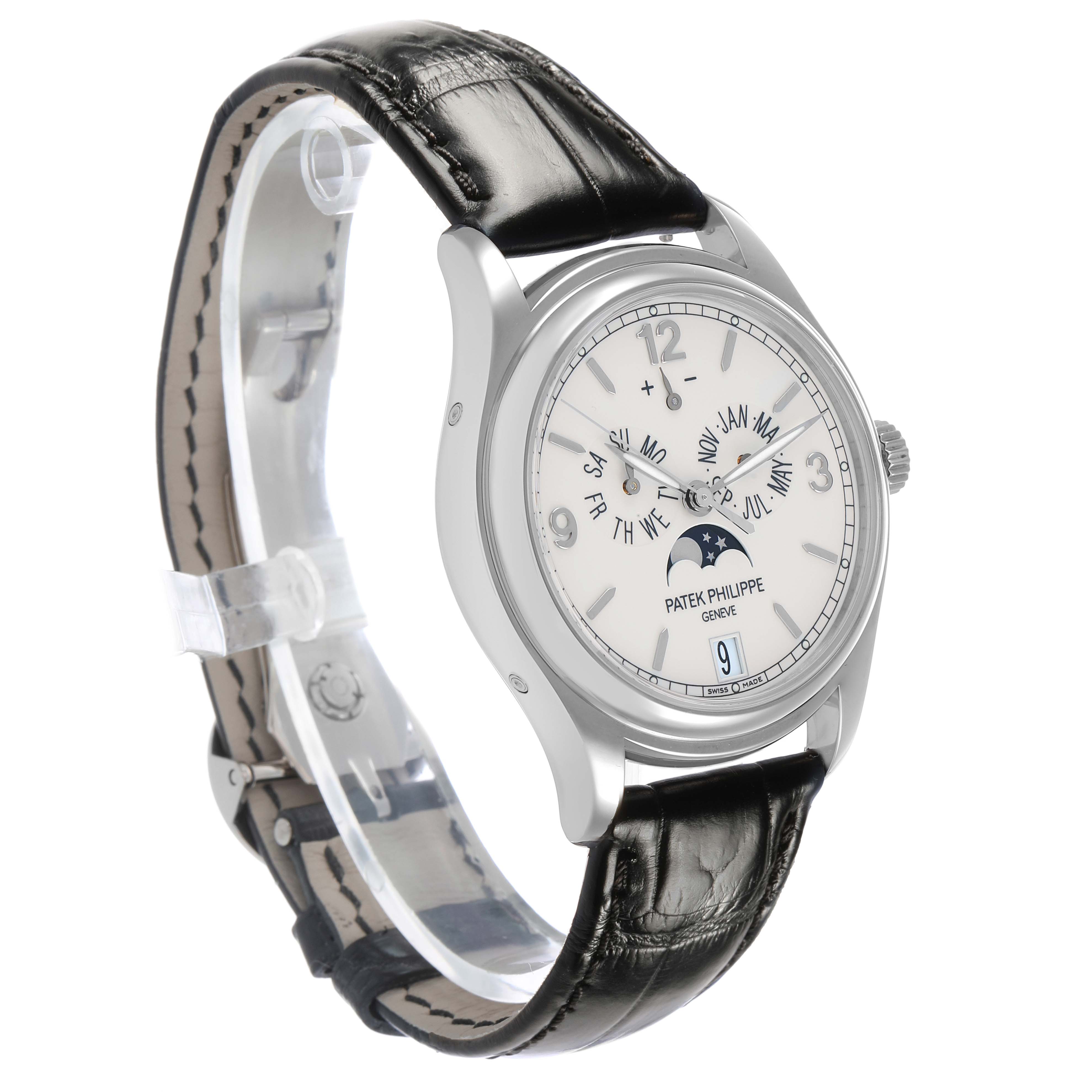 The Patek Philippe Complications 5146G Men's White Gold White Dial watch is shown in a three-quarter angle, displaying its dial, case, leather strap, and crown.