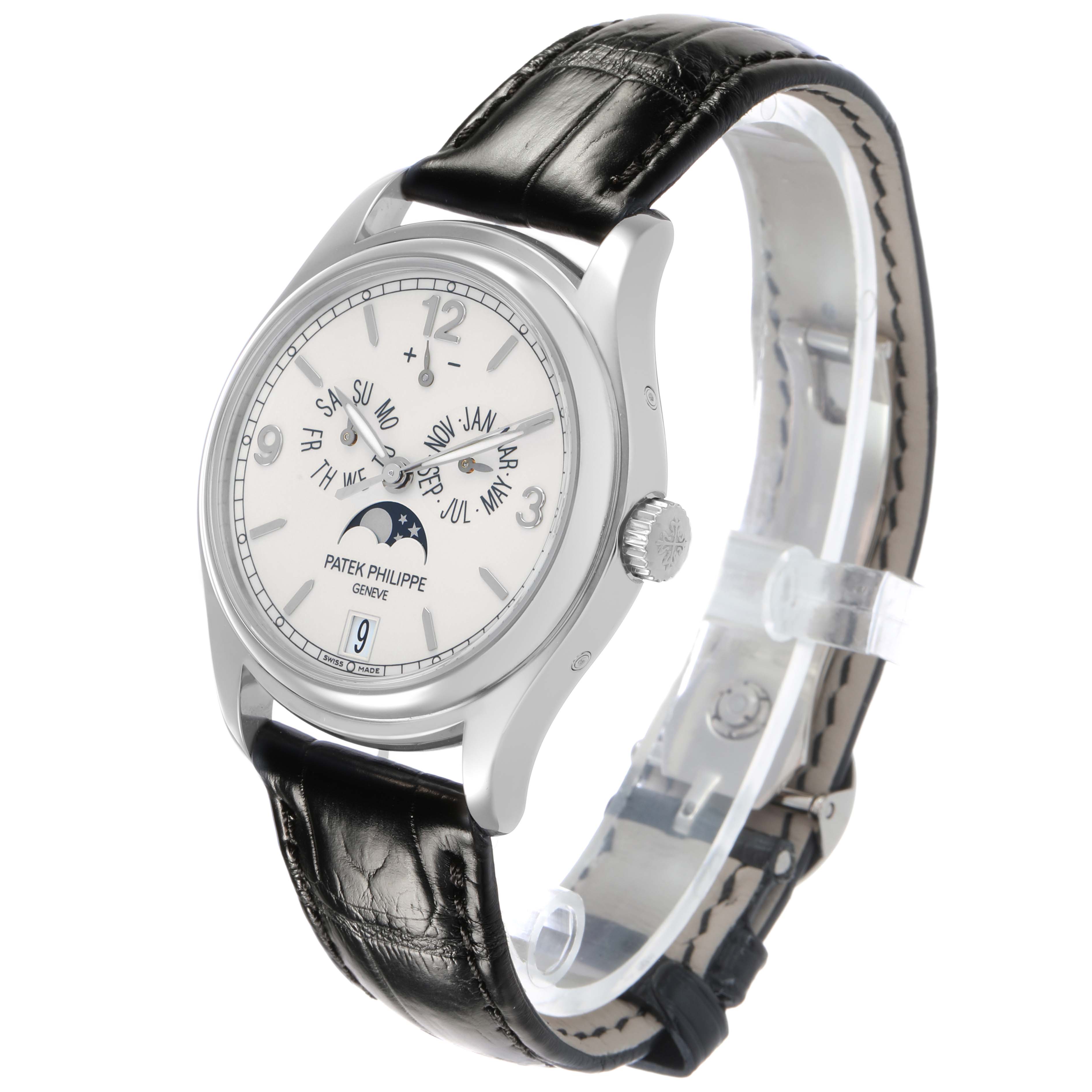 The Patek Philippe Complications 5146G Men's White Gold White Dial watch is shown at an angled side view, highlighting the dial, crown, and leather strap.