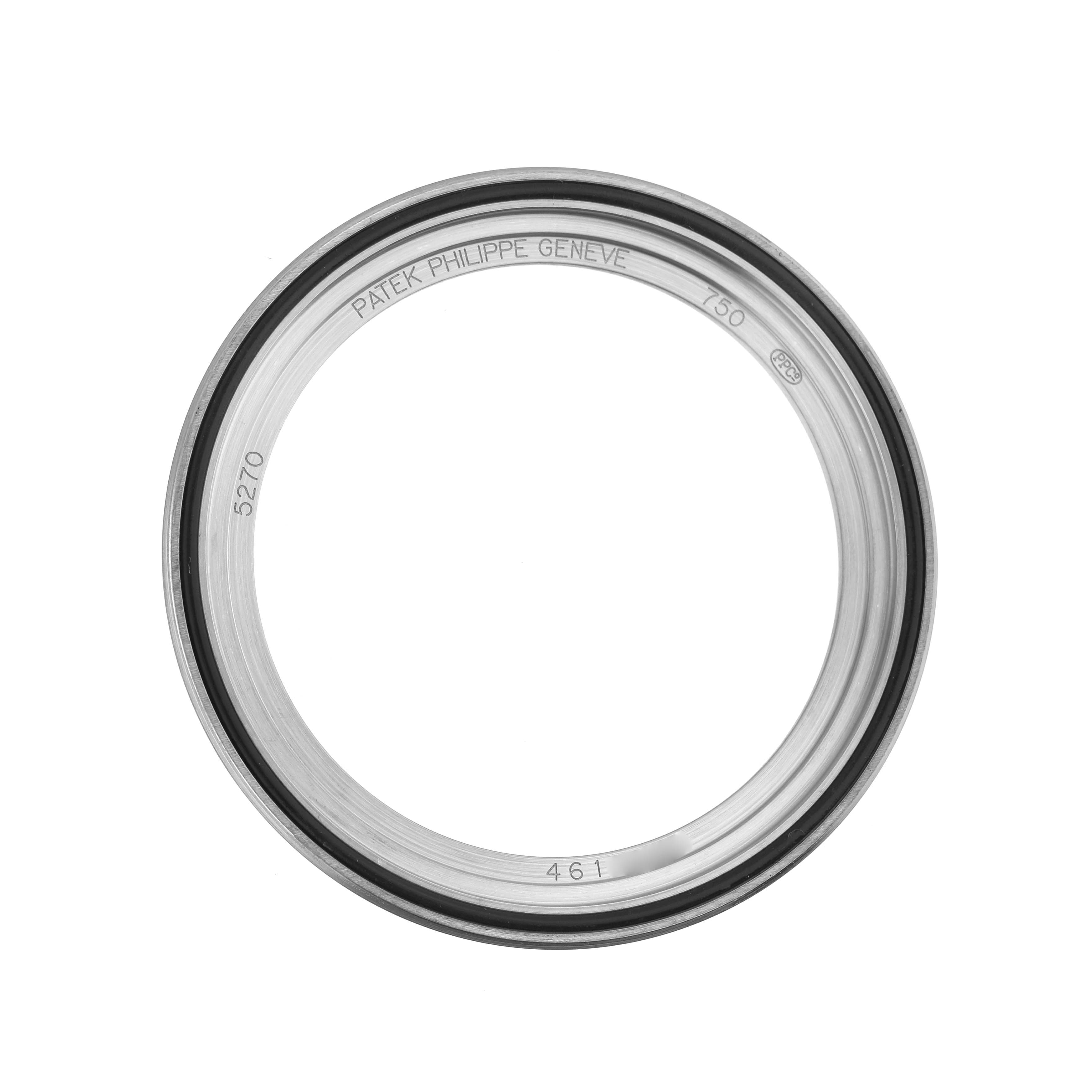 This is a top view of the bezel for the Patek Philippe Complications 5270 Men's White Gold Silver Dial model, showing its engravings and inner details.
