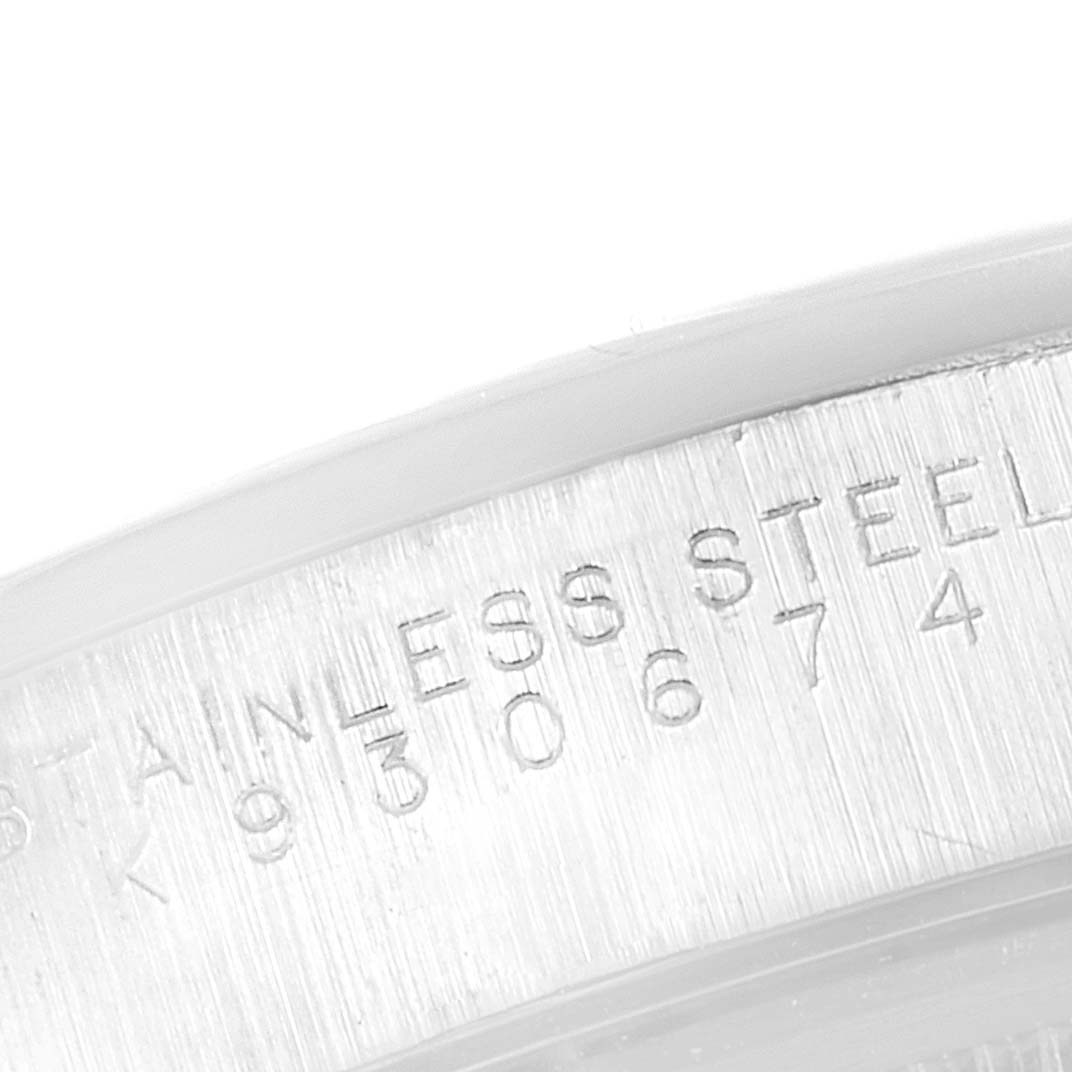 This image shows a close-up of the stainless steel casing with etched details on the Rolex Air-King 14000 Men's Stainless Steel Blue Dial 14000 Men's Stainless Steel Blue Dial watch.