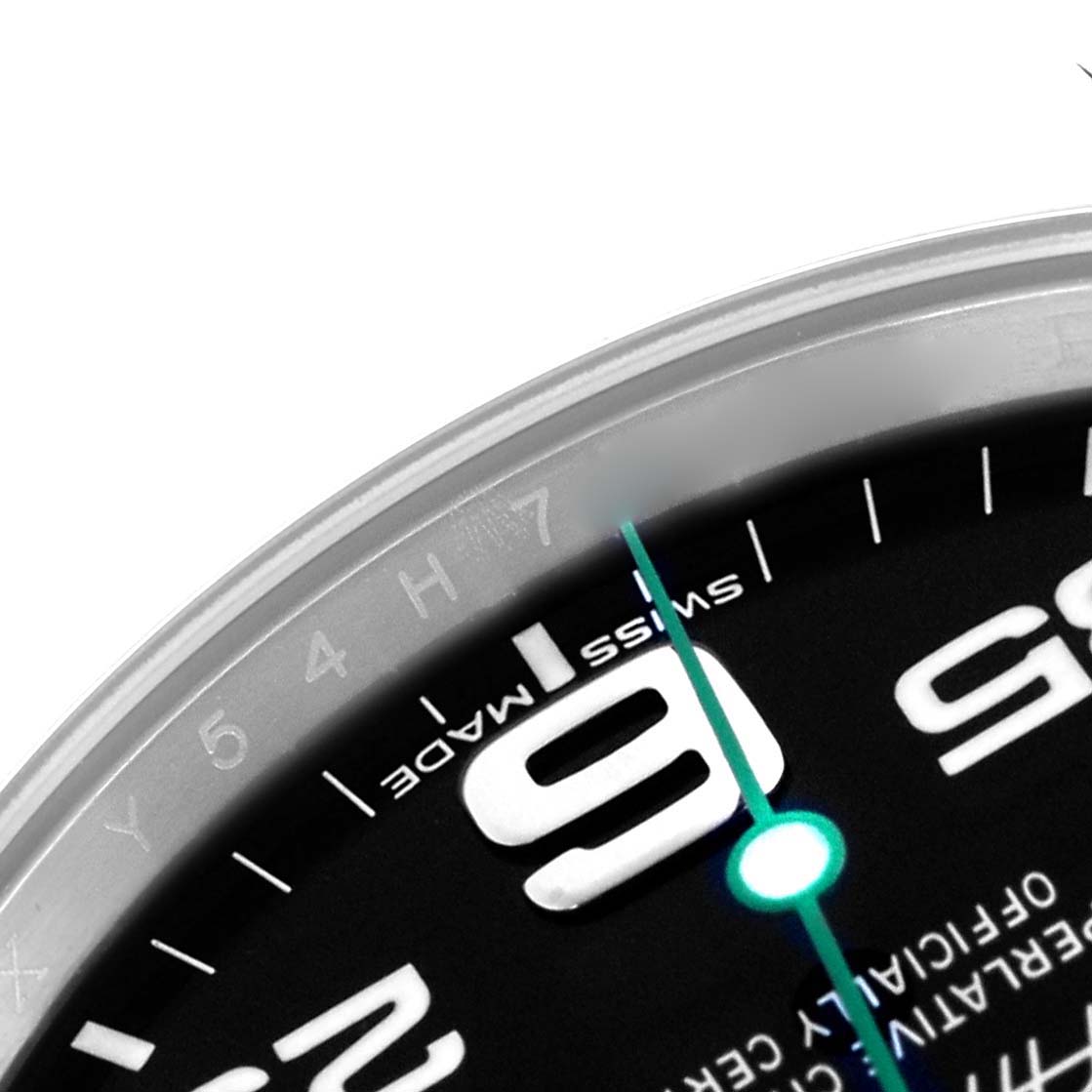 The image shows a partial close-up of the Rolex Air-King 116900 Men's Stainless Steel Black Dial 116900 Men's Stainless Steel Black Dial's dial, focusing on the "9" numeral and minute markers.
