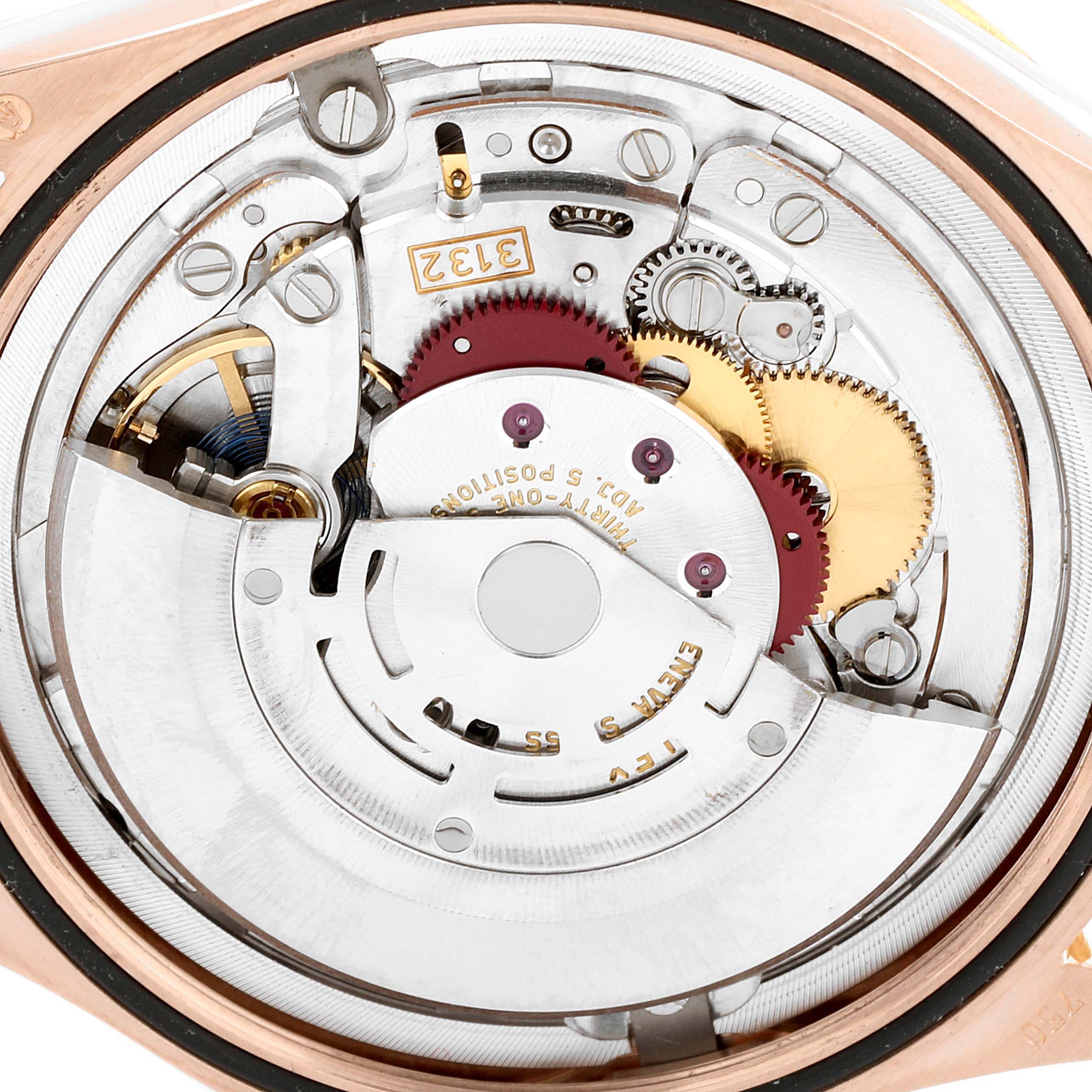 This image shows an up-close view of the movement mechanism of a Rolex Cellini 50605 Men
s Rose Gold Black Dial 50605 Men
s Rose Gold Black Dial watch.