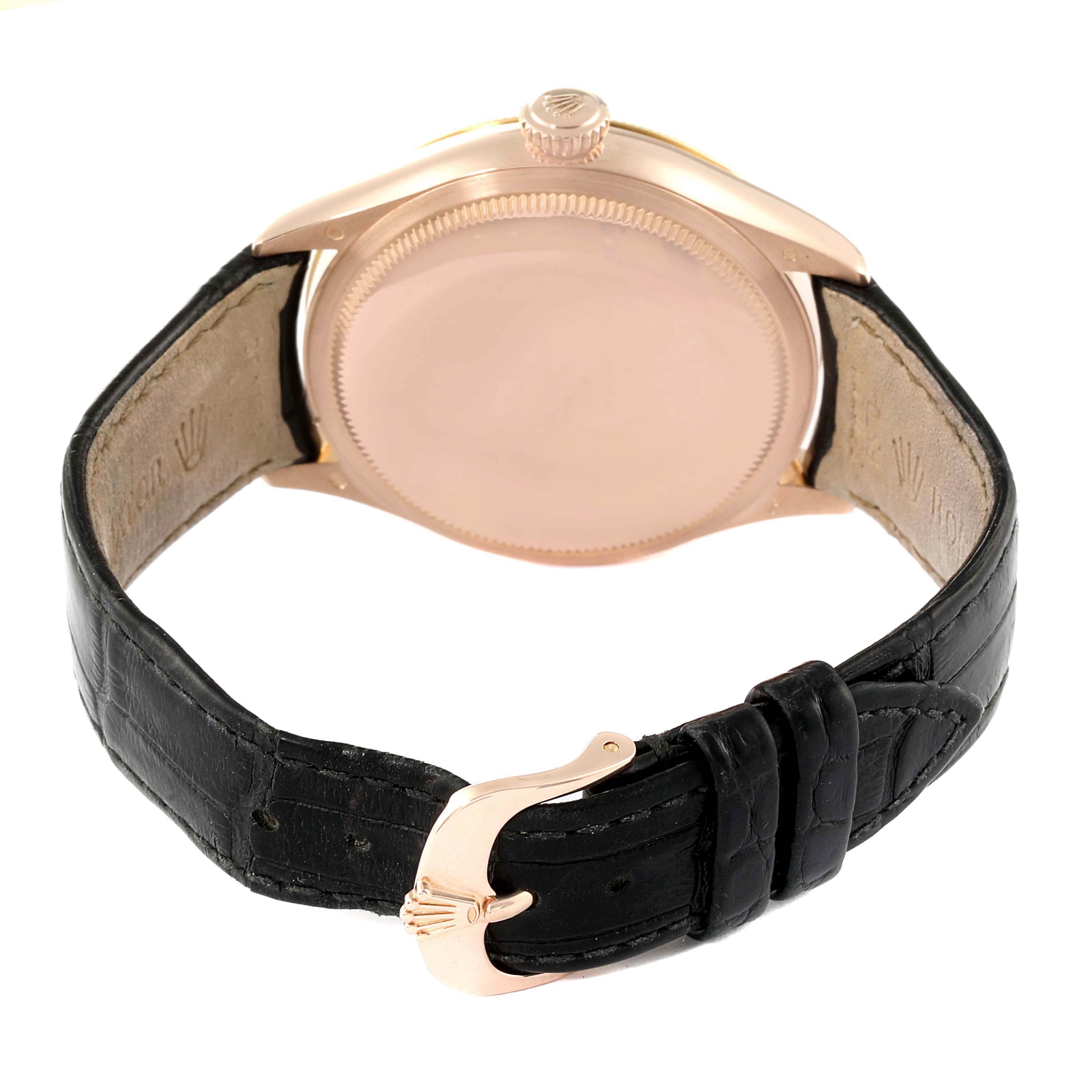 The image shows the back, crown, and strap of a Rolex Cellini 50605 Men
s Rose Gold Black Dial 50605 Men
s Rose Gold Black Dial watch from a rear angle.