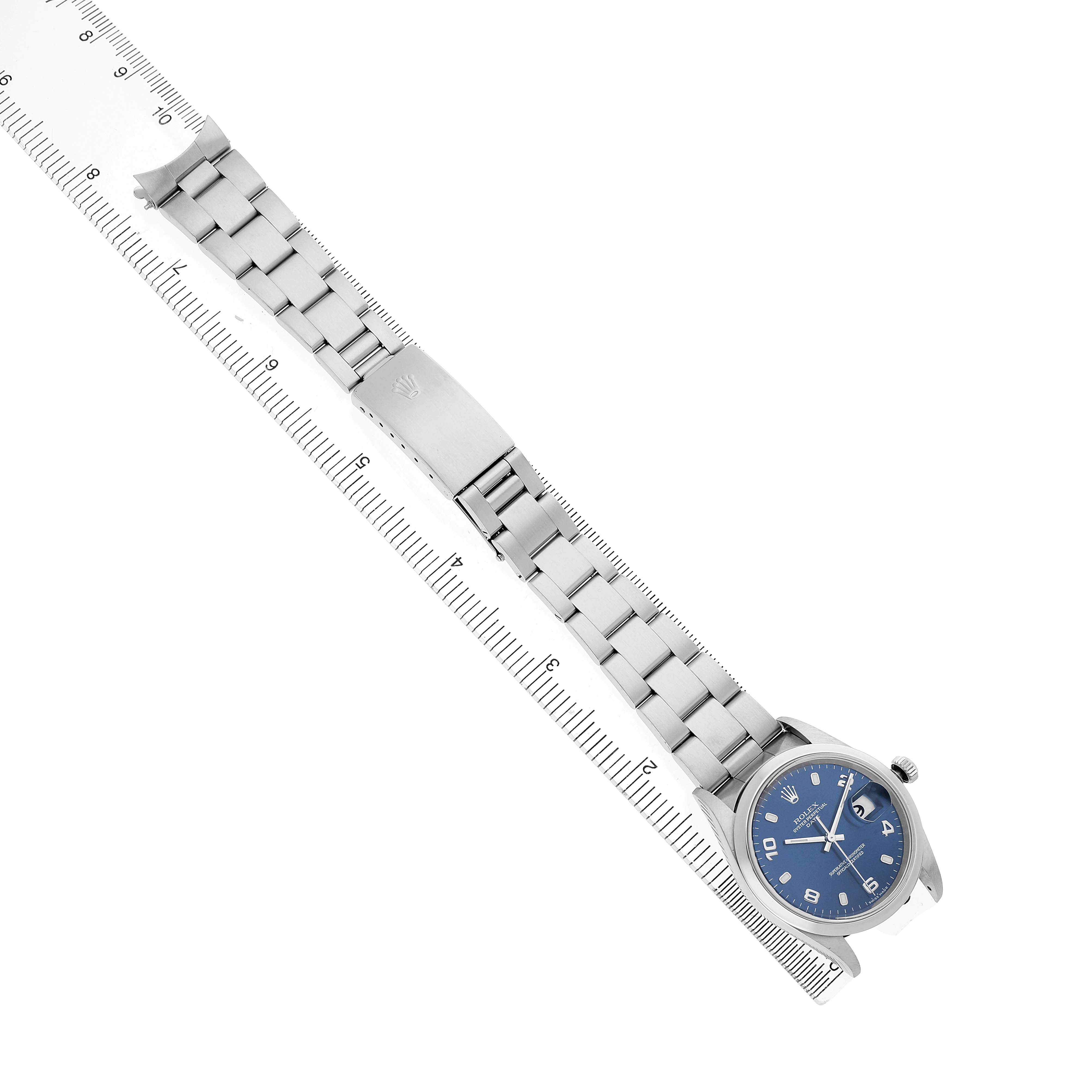 The Rolex Date 15200 Men's Stainless Steel Blue Dial watch is shown from a top-down angle, displaying the full bracelet, clasp, and face with a blue dial.