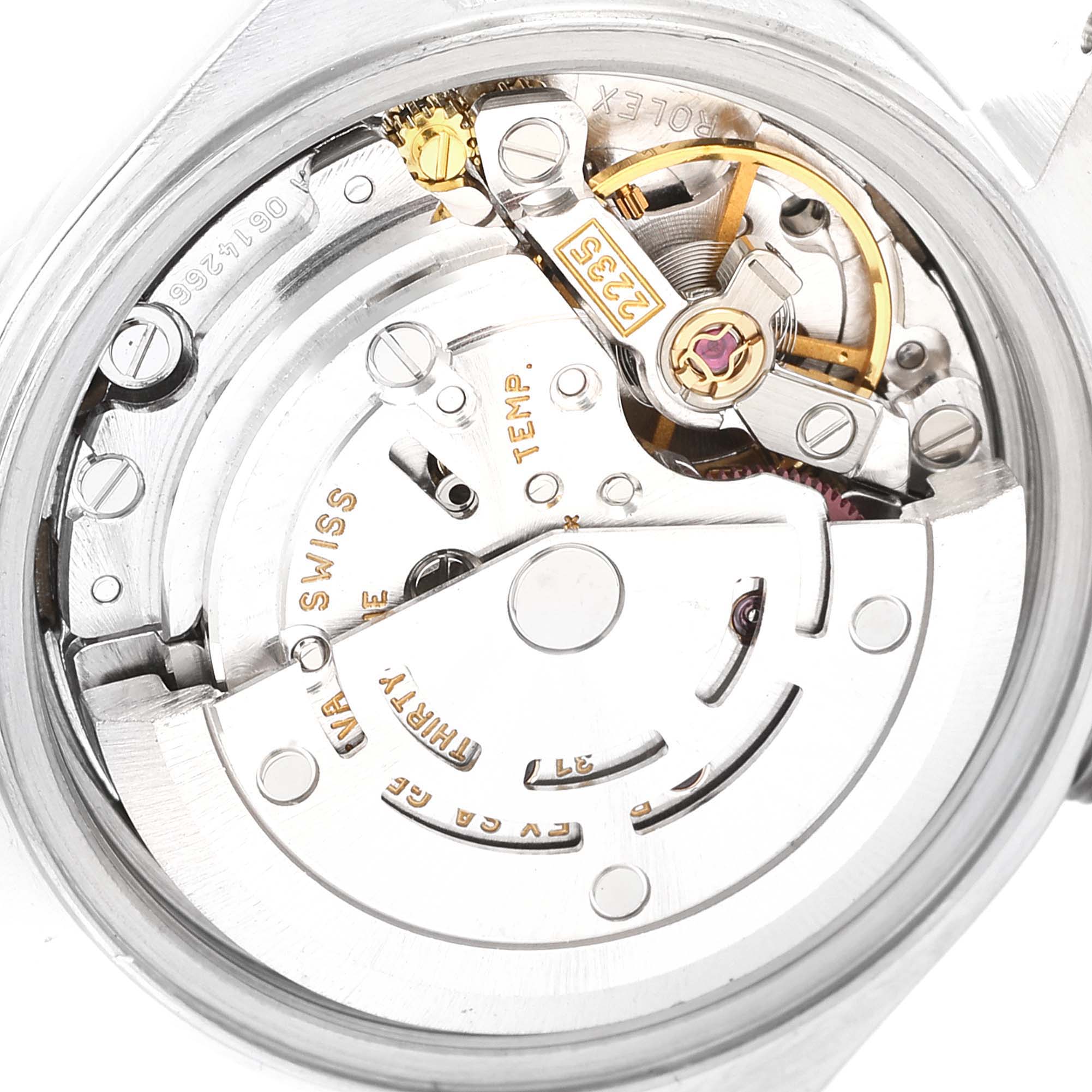 The image shows the inner mechanical movement of a Rolex Date 79160 Women
s Stainless Steel Silver Dial 79160 Women
s Stainless Steel Silver Dial model watch, viewed from the back.