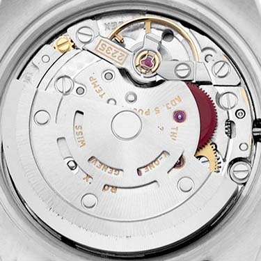 This image shows the movement and internal mechanism of a Rolex Datejust 179383 Women's Steel and Gold (two tone) Champagne Dial 179383 Women's Steel and Gold (two tone) Champagne Dial watch from a rear angle.