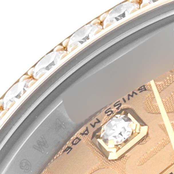 The image shows a close-up of the bezel and part of the dial of a Rolex Datejust 179383 Women's Steel and Gold (two tone) Champagne Dial 179383 Women's Steel and Gold (two tone) Champagne Dial watch, highlighting the diamonds.