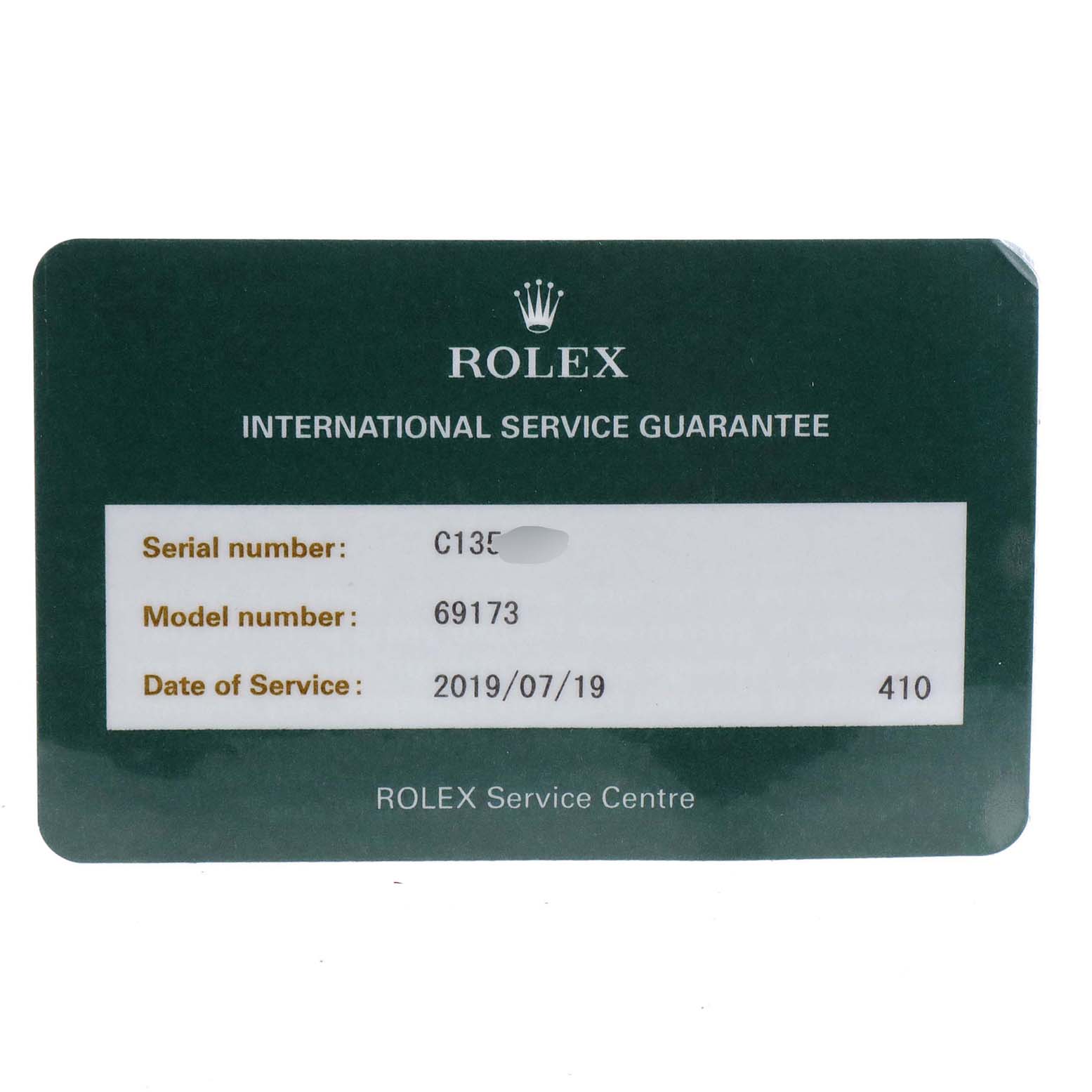 This image shows an international service guarantee card for a Rolex Datejust 69173 Women's Steel and Gold (two tone) Champagne Dial 69173 Women's Steel and Gold (two tone) Champagne Dial model.