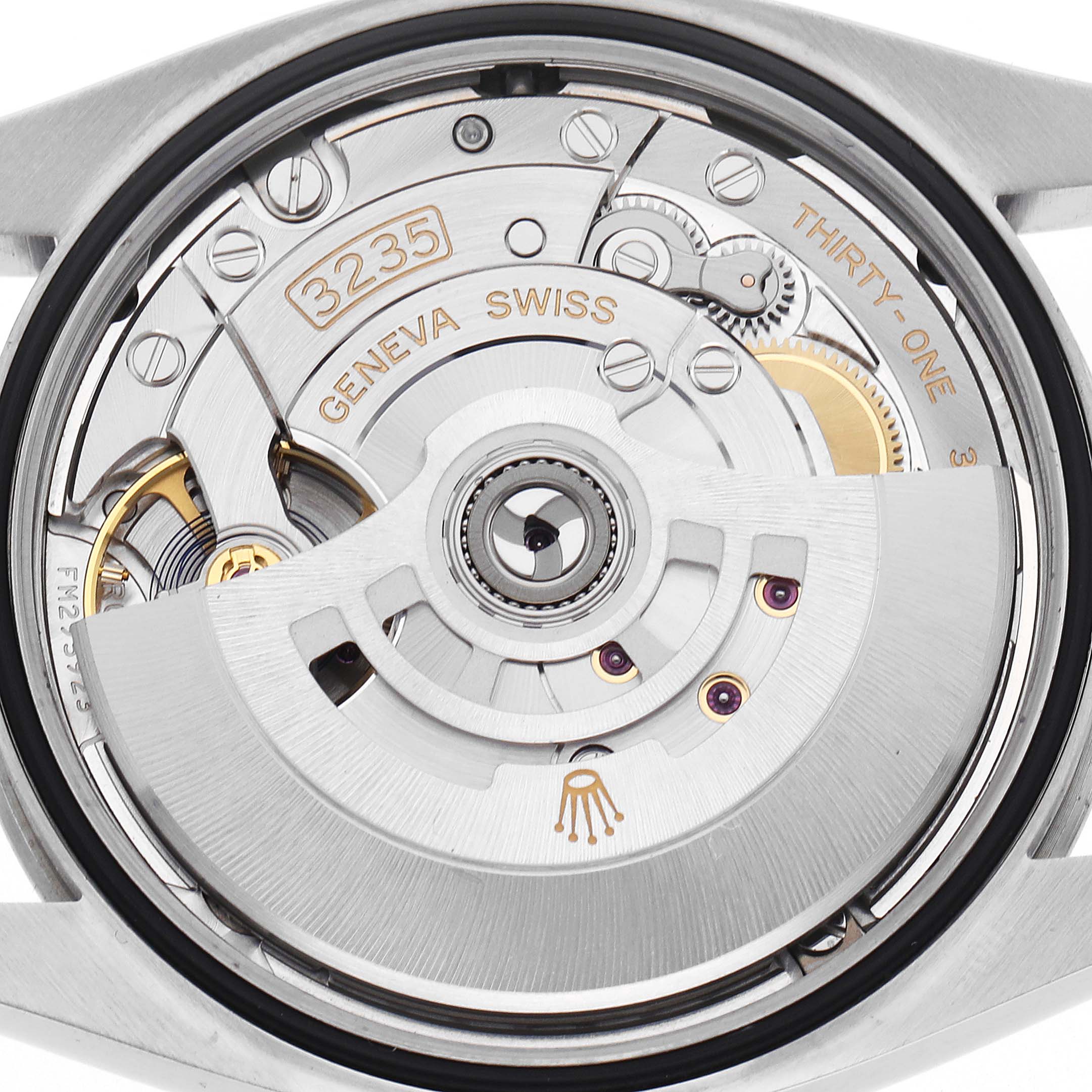 The image shows the movement of the Rolex Datejust 126200 Men
s Stainless Steel Black Dial 126200 Men
s Stainless Steel Black Dial, showcasing the intricate mechanics including the oscillating weight and gears.