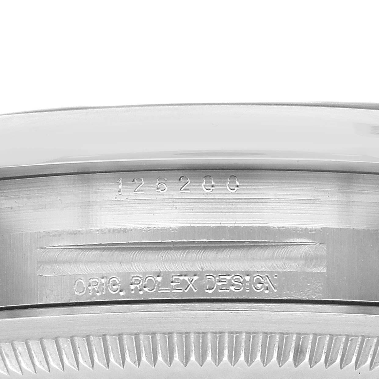 The image shows the side view of a Rolex Datejust 126200 Men
s Stainless Steel Black Dial 126200 Men
s Stainless Steel Black Dial watch, focusing on the bezel and engraved design details.