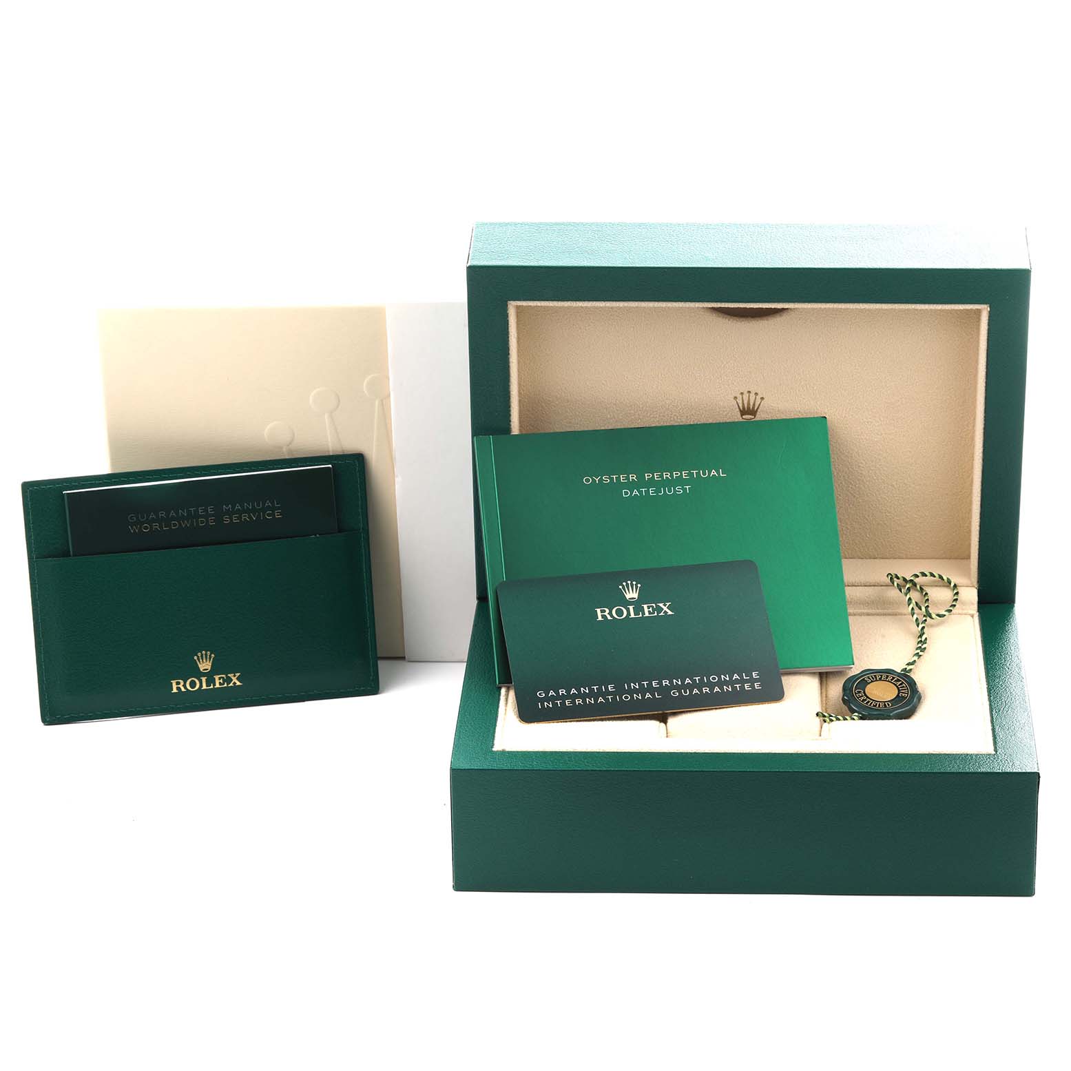 The image shows a Rolex Datejust 126200 Men
s Stainless Steel Black Dial 126200 Men
s Stainless Steel Black Dial watch box, manuals, guarantee cards, and a green hangtag at a front-facing angle.