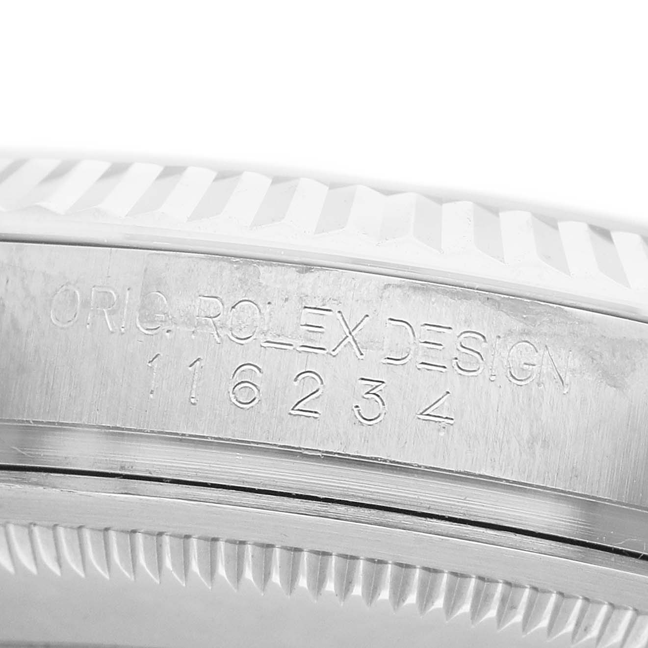 The image shows a close-up of the engraved side of the bezel on a Rolex Datejust 116234 Men's Stainless Steel Silver Dial watch.