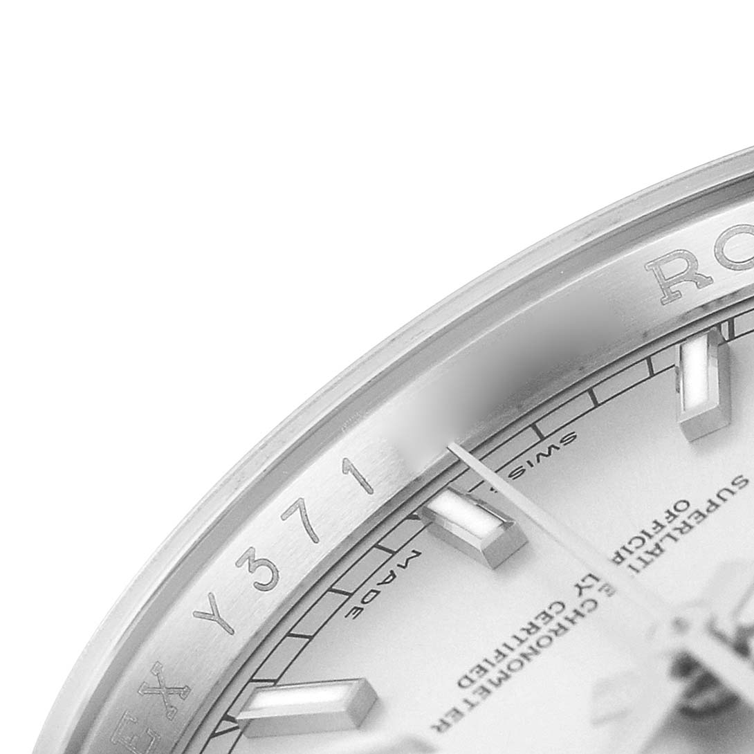 The image shows a close-up of the Rolex Datejust 116234 Men's Stainless Steel Silver Dial watch face, focusing on part of the bezel and dial with indices.