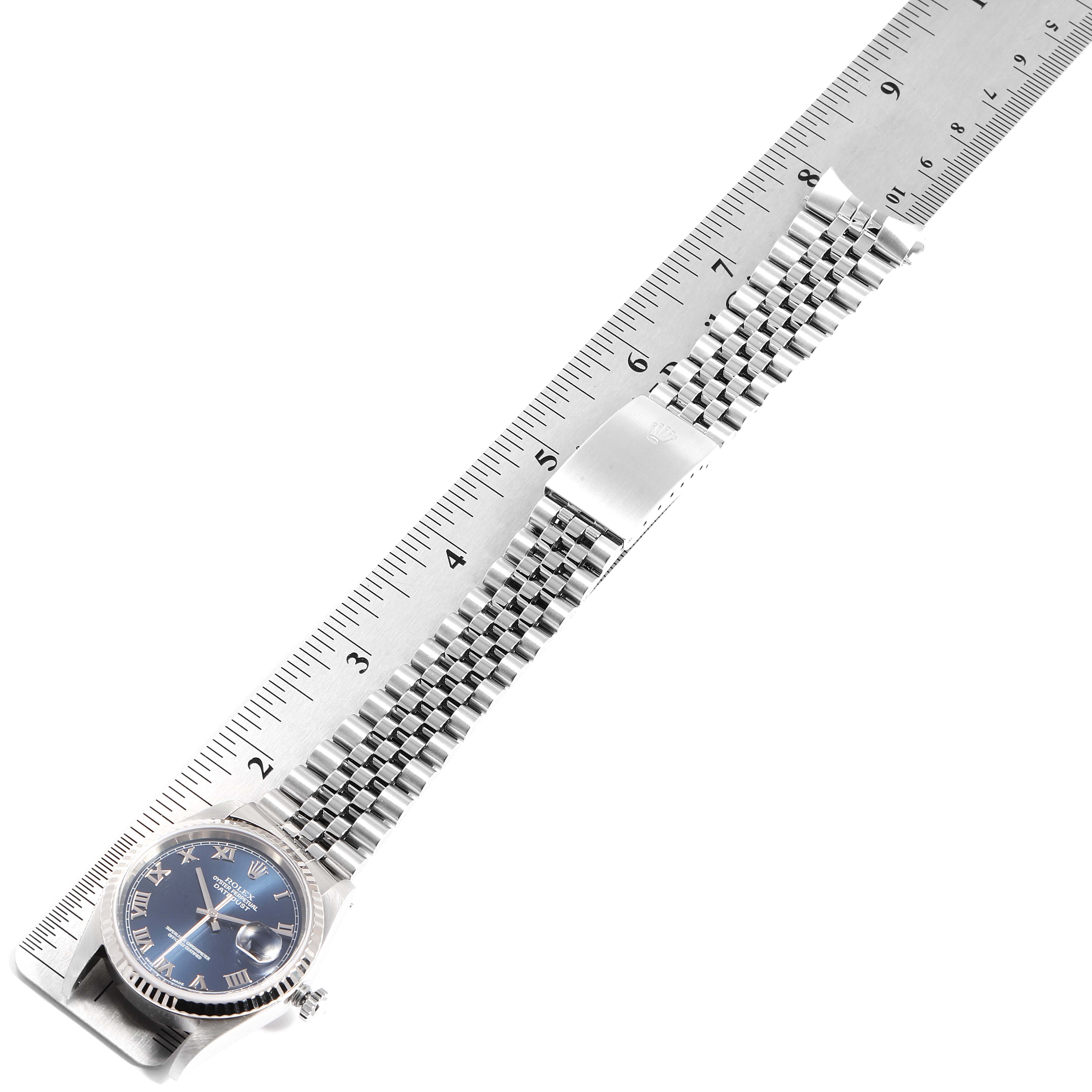 This image shows a Rolex Datejust 16234 Women's Stainless Steel Blue Dial 16234 Women's Stainless Steel Blue Dial watch laid flat, measured against a ruler, displaying the face, bracelet, and clasp.