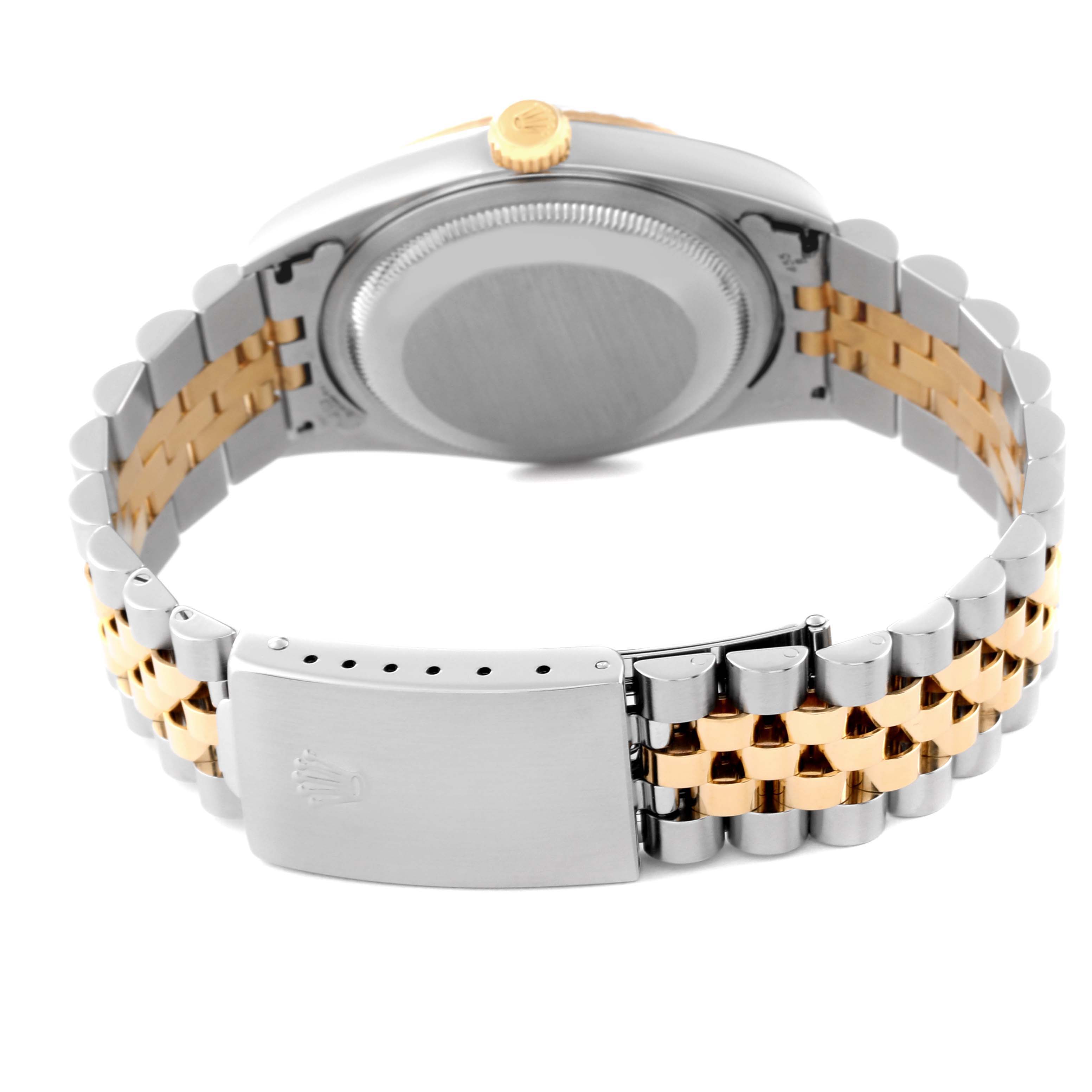 The image shows a Rolex Datejust 16233 Men's Steel and Gold (two tone) Black Dial 16233 Men's Steel and Gold (two tone) Black Dial watch from the backside, highlighting the stainless steel and gold bracelet and clasp.