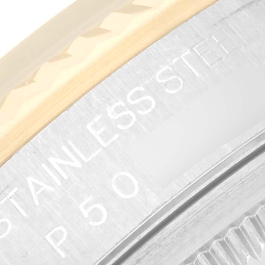 The image shows a close-up of the stainless steel casing and part of the bezel of a Rolex Datejust 16233 Men's Steel and Gold (two tone) Black Dial 16233 Men's Steel and Gold (two tone) Black Dial watch.