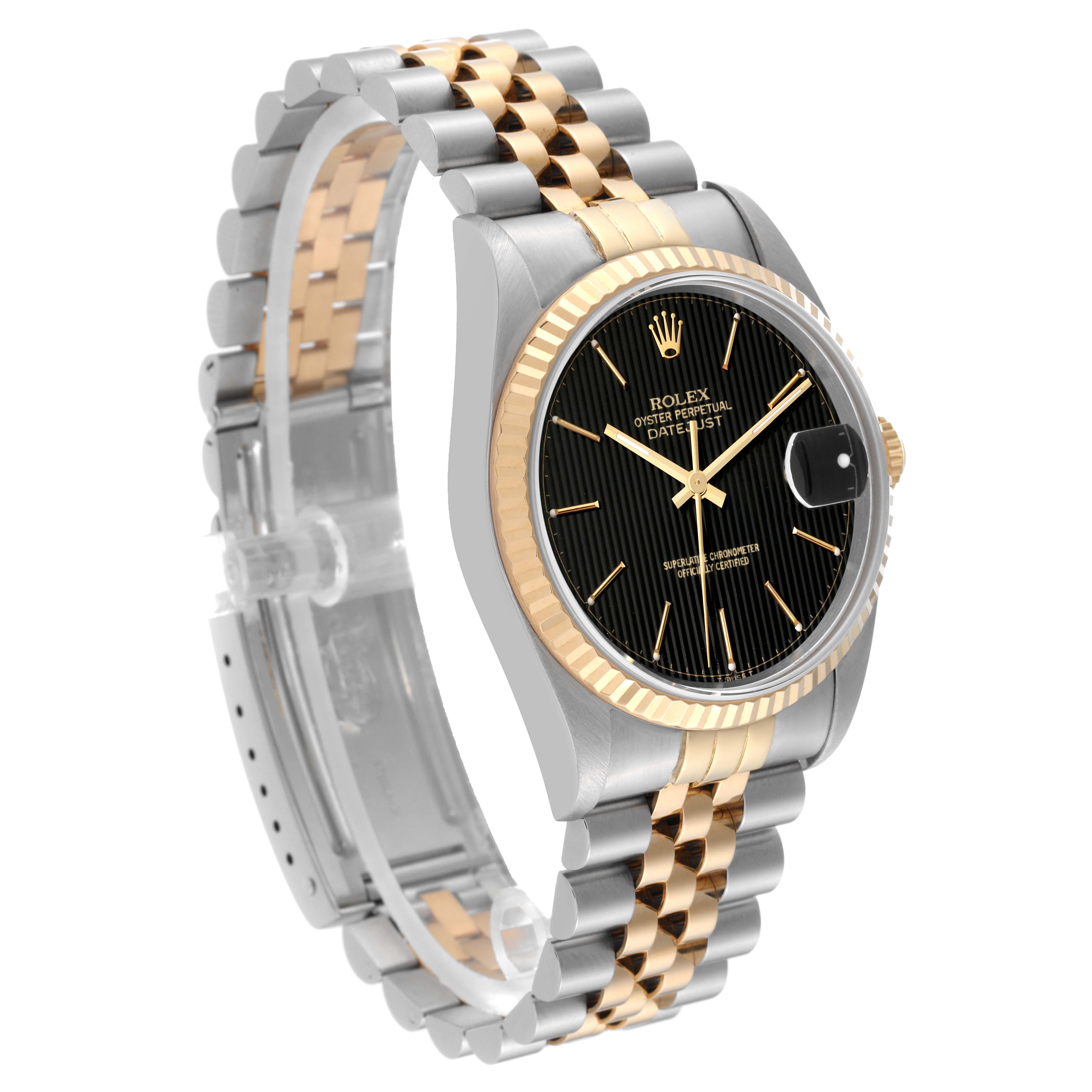 This image shows a Rolex Datejust 16233 Men's Steel and Gold (two tone) Black Dial 16233 Men's Steel and Gold (two tone) Black Dial watch at an oblique angle, highlighting its two-tone bracelet, black dial, and fluted bezel.