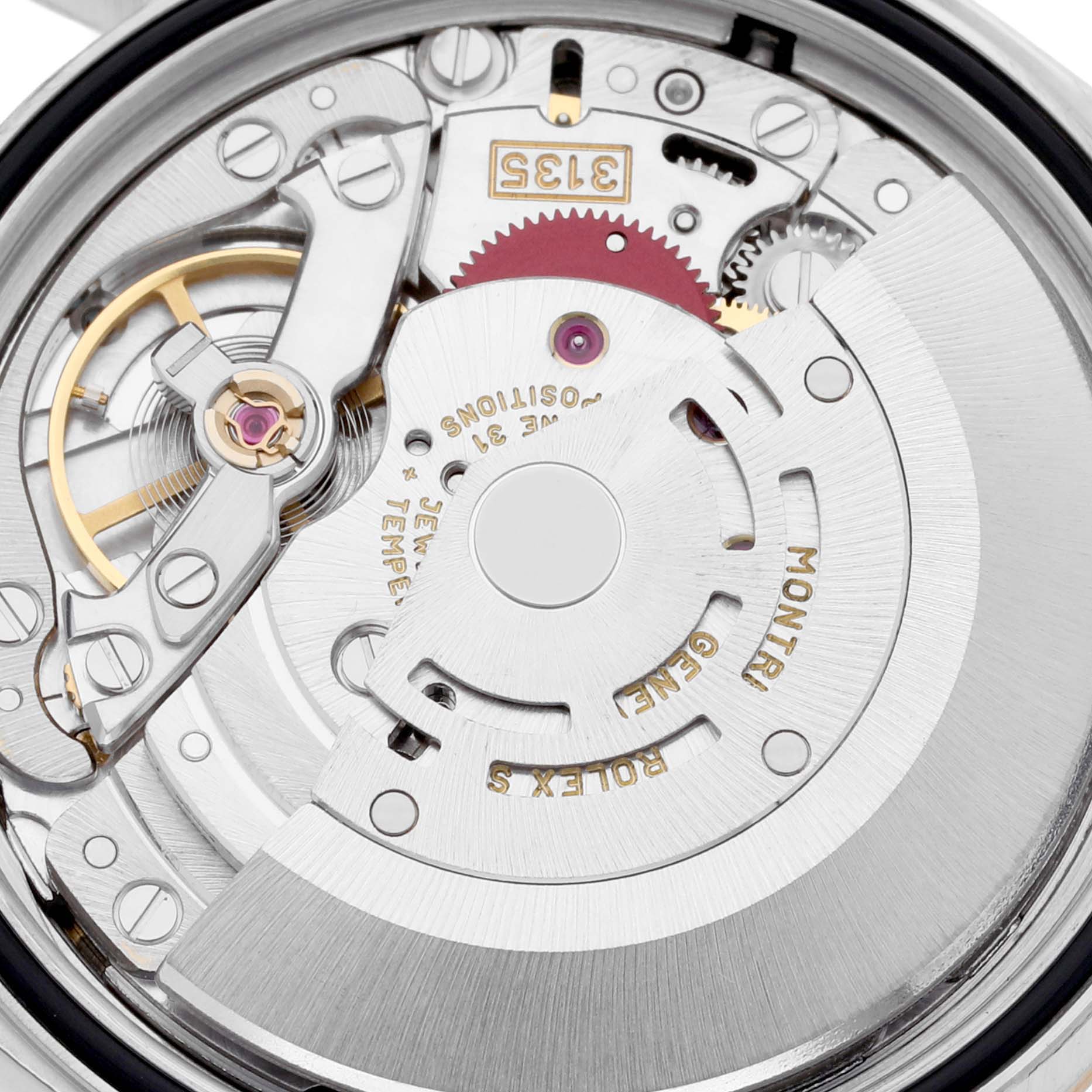 The image shows the intricate internal mechanism of a Rolex Datejust 16233 Men's Steel and Gold (two tone) Champagne Dial 16233 Men's Steel and Gold (two tone) Champagne Dial watch from a close-up angle.