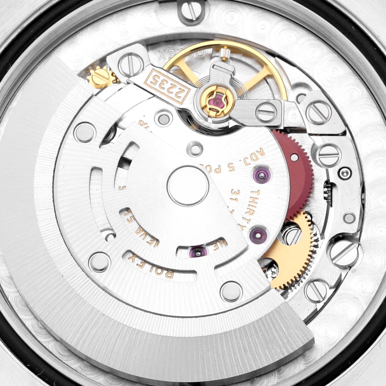 The image shows an internal view of a Rolex Mid-Size 178341 Women's Steel and Gold (two tone) Brown Dial 178341 Women's Steel and Gold (two tone) Brown Dial watch movement, displaying its intricate gears and components.
