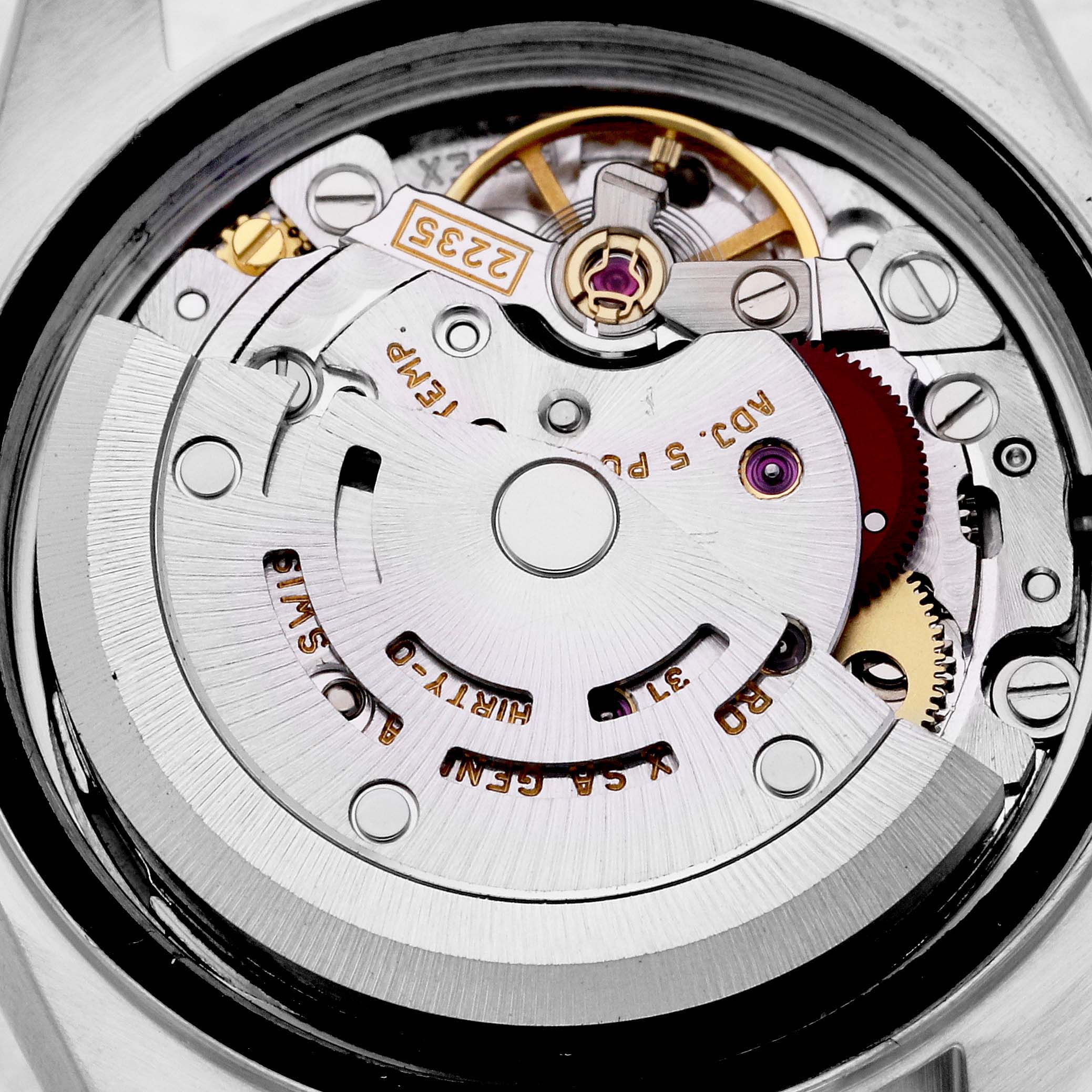 This image shows the intricate mechanical movement of a Rolex Datejust 79174 Women's Stainless Steel White Dial 79174 Women's Stainless Steel White Dial watch from a rear angle.