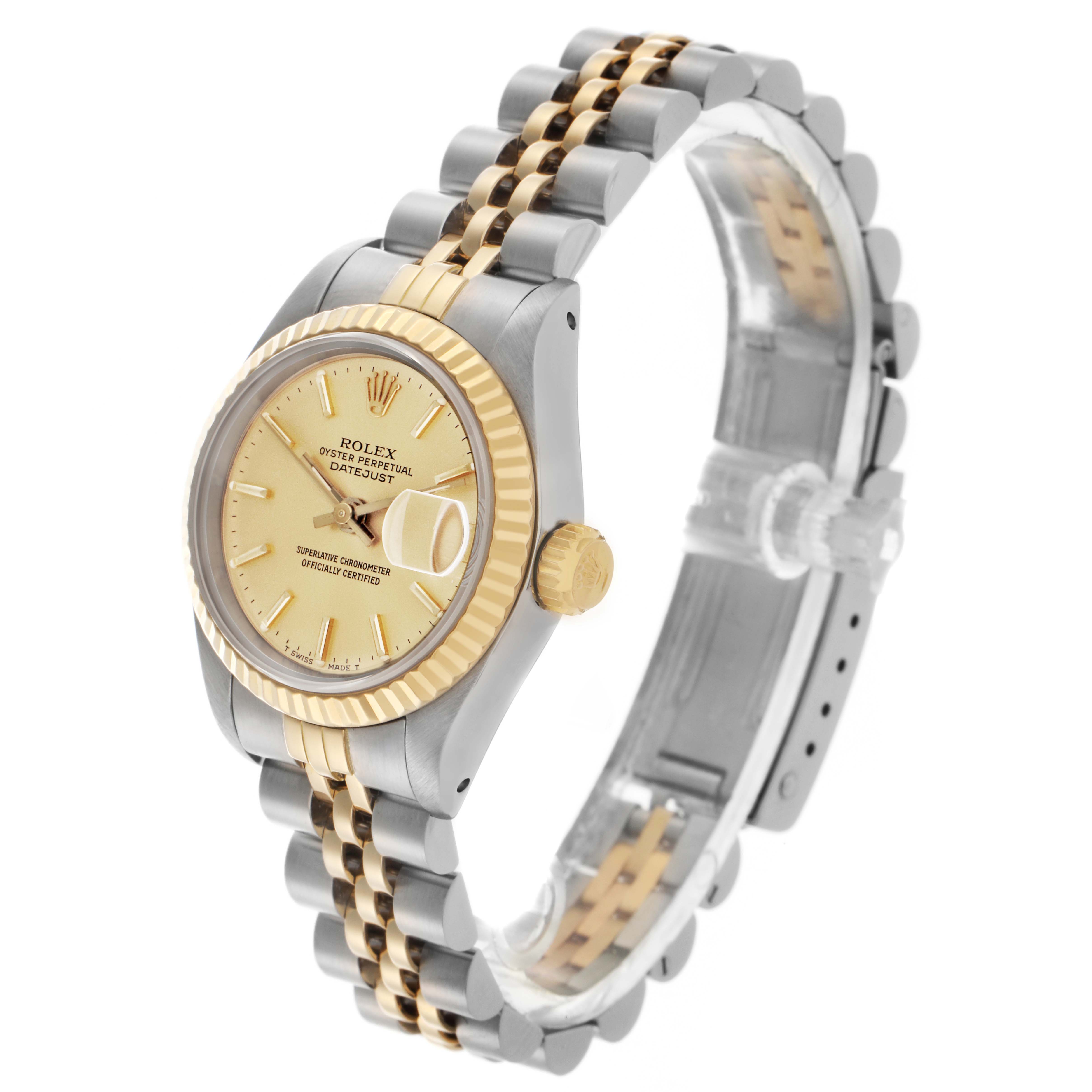 The Rolex Datejust 69173 Women
s Steel and Gold (two tone) Champagne Dial 69173 Women
s Steel and Gold (two tone) Champagne Dial watch is shown at an angle highlighting the face, bracelet, fluted bezel, and crown.
