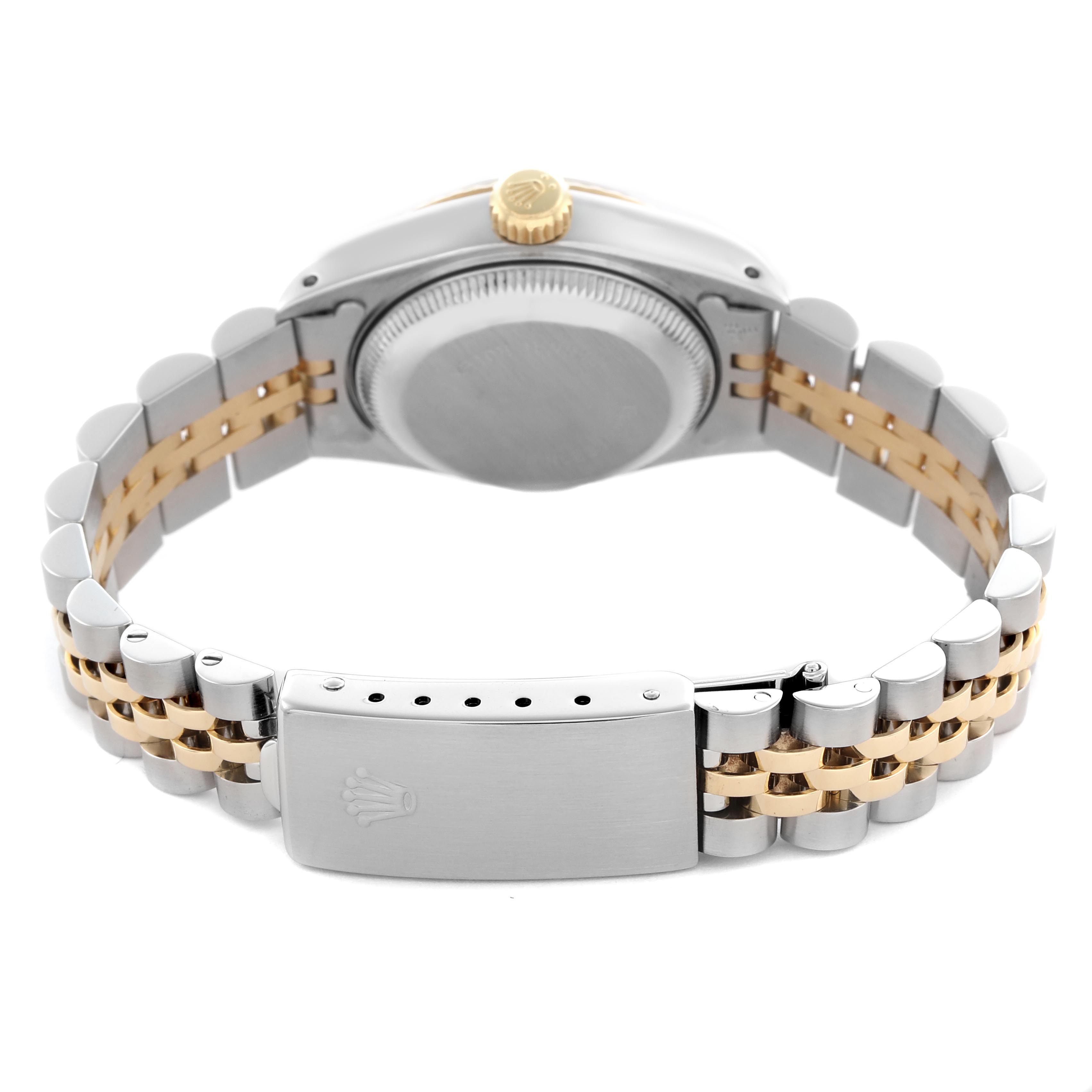The image shows the back and bracelet of a Rolex Datejust 69173 Women
s Steel and Gold (two tone) Champagne Dial 69173 Women
s Steel and Gold (two tone) Champagne Dial, highlighting the clasp and two-tone link design.