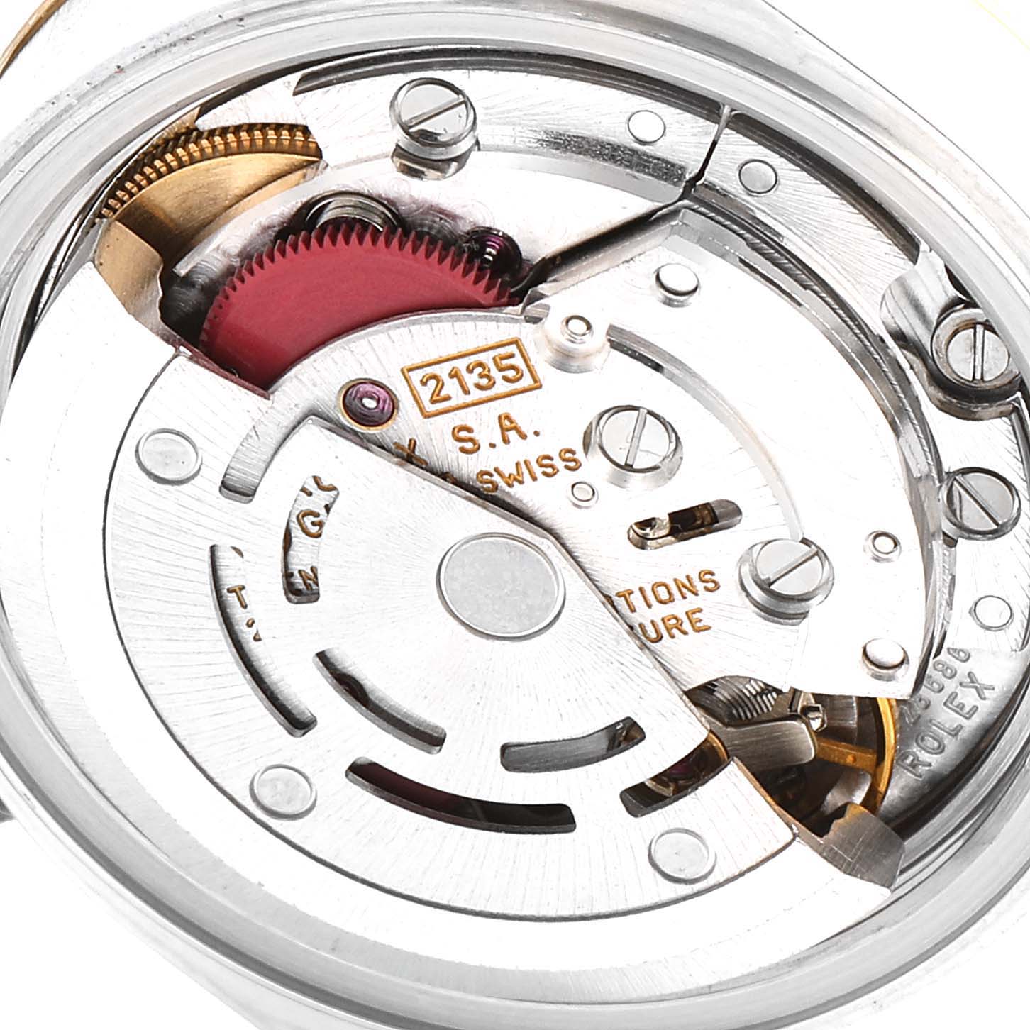 This image shows the inner mechanism of the Rolex Datejust 69173 Women's Steel and Gold (two tone) Blue Dial 69173 Women's Steel and Gold (two tone) Blue Dial watch, highlighting its intricate automatic movement components.