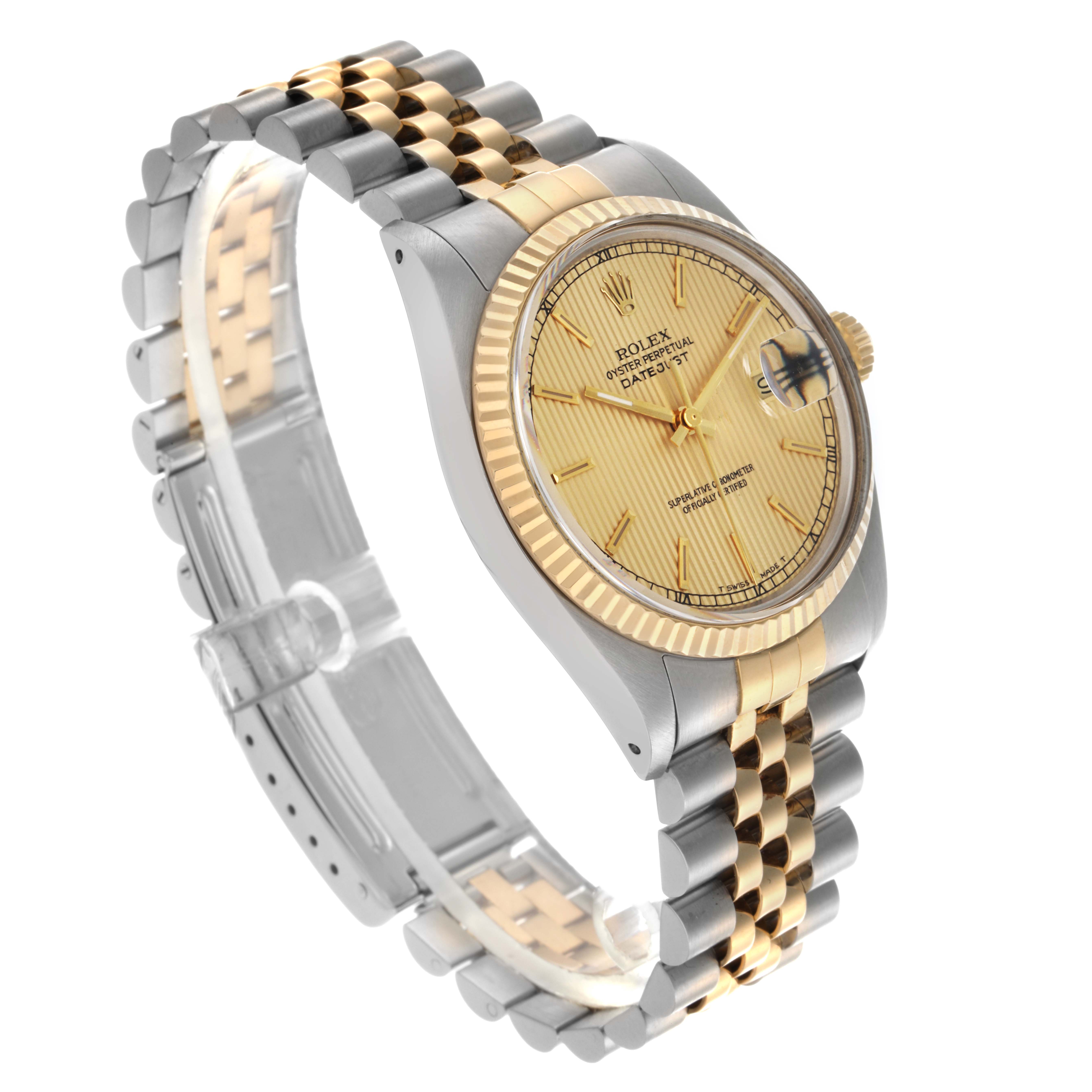 The Rolex Datejust 16013 Men
s Steel and Gold (two tone) Champagne Dial 16013 Men
s Steel and Gold (two tone) Champagne Dial watch is shown at a three-quarter angle, displaying the dial, fluted bezel, and two-tone Jubilee bracelet.