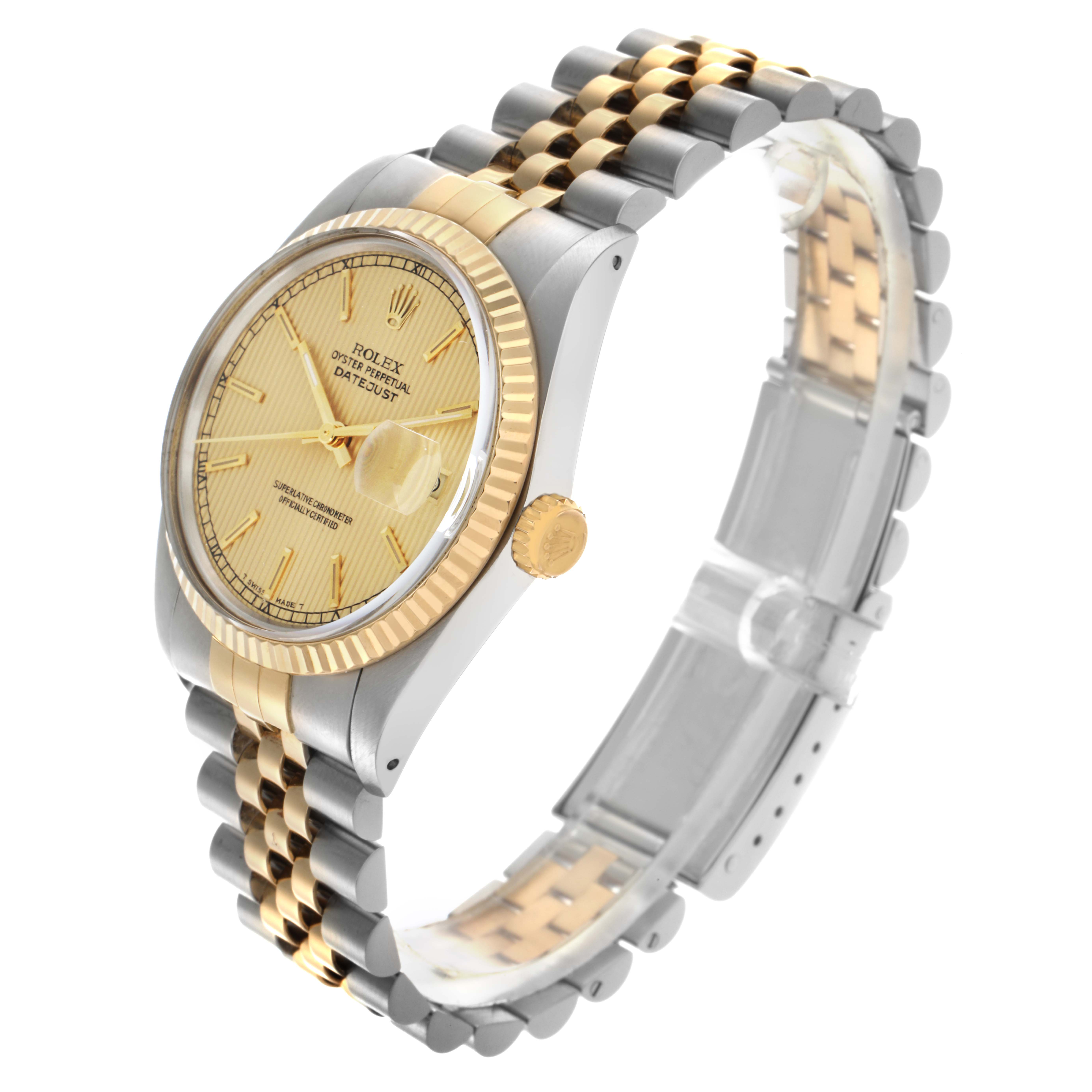 The image shows a Rolex Datejust 16013 Men
s Steel and Gold (two tone) Champagne Dial 16013 Men
s Steel and Gold (two tone) Champagne Dial watch angled to highlight the face, fluted bezel, crown, and two-tone jubilee bracelet.