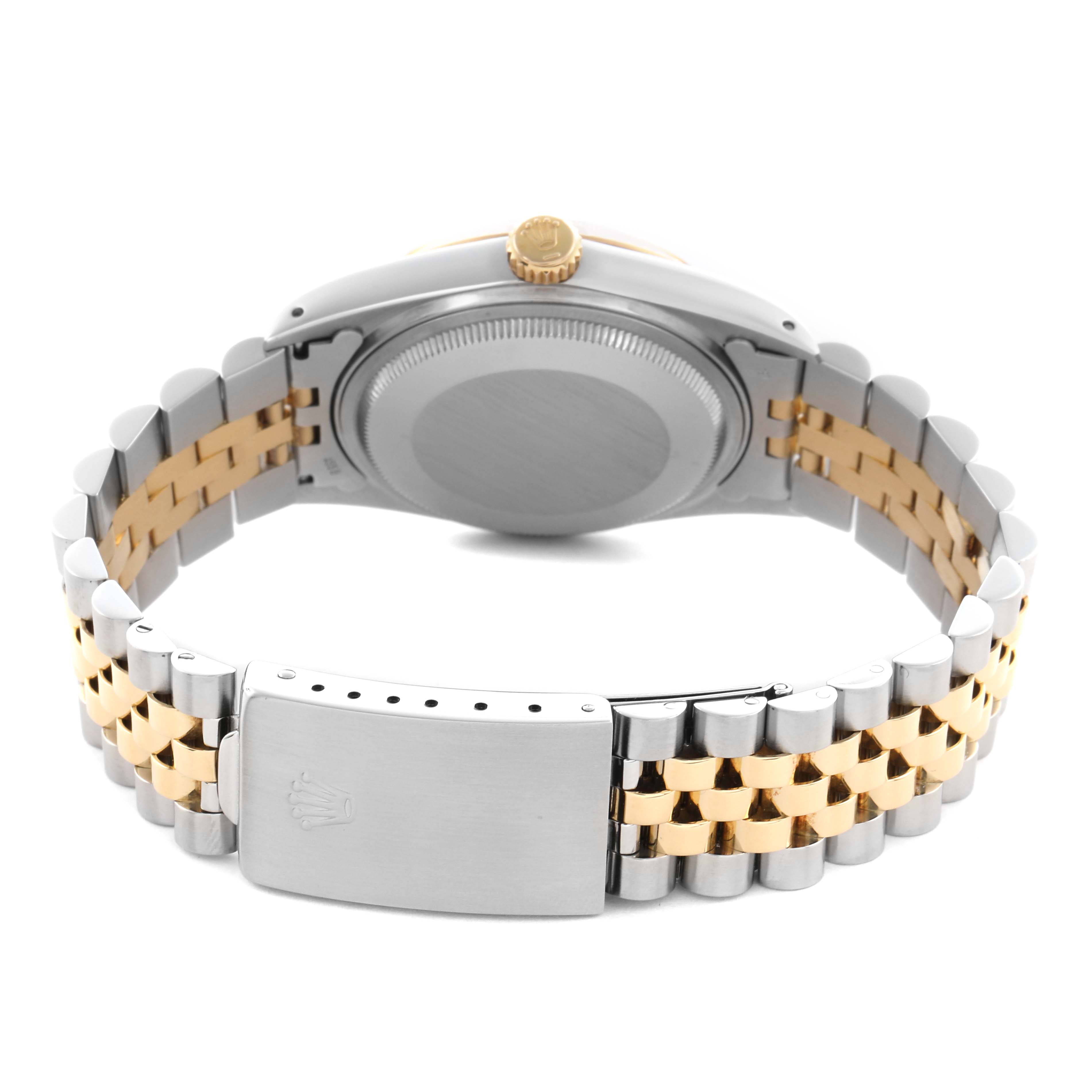 The image shows the back of a Rolex Datejust 16013 Men
s Steel and Gold (two tone) Champagne Dial 16013 Men
s Steel and Gold (two tone) Champagne Dial watch, highlighting the case back, crown, and two-tone bracelet.