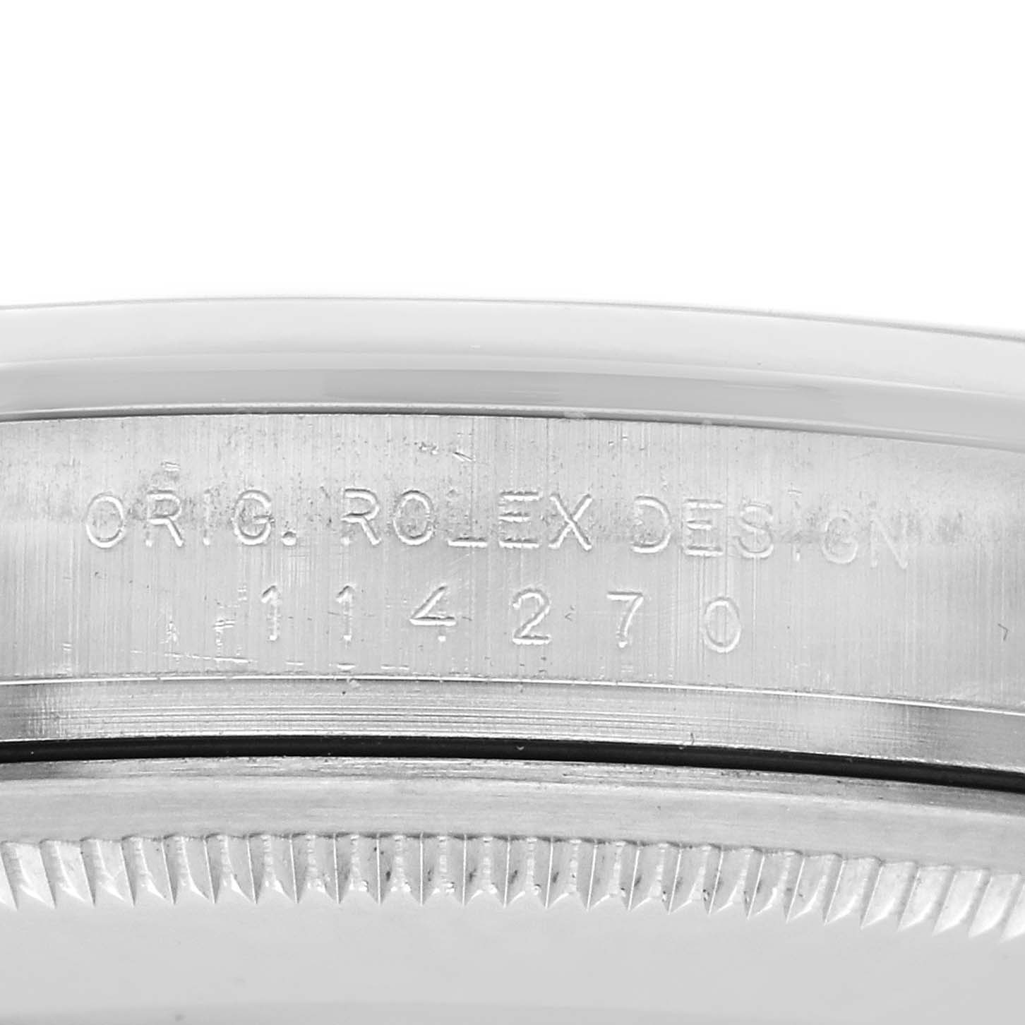 The image shows the side view of a Rolex Explorer 114270 Men
s Stainless Steel Black Dial 114270 Men
s Stainless Steel Black Dial watch case, highlighting the engraved model number "114270."