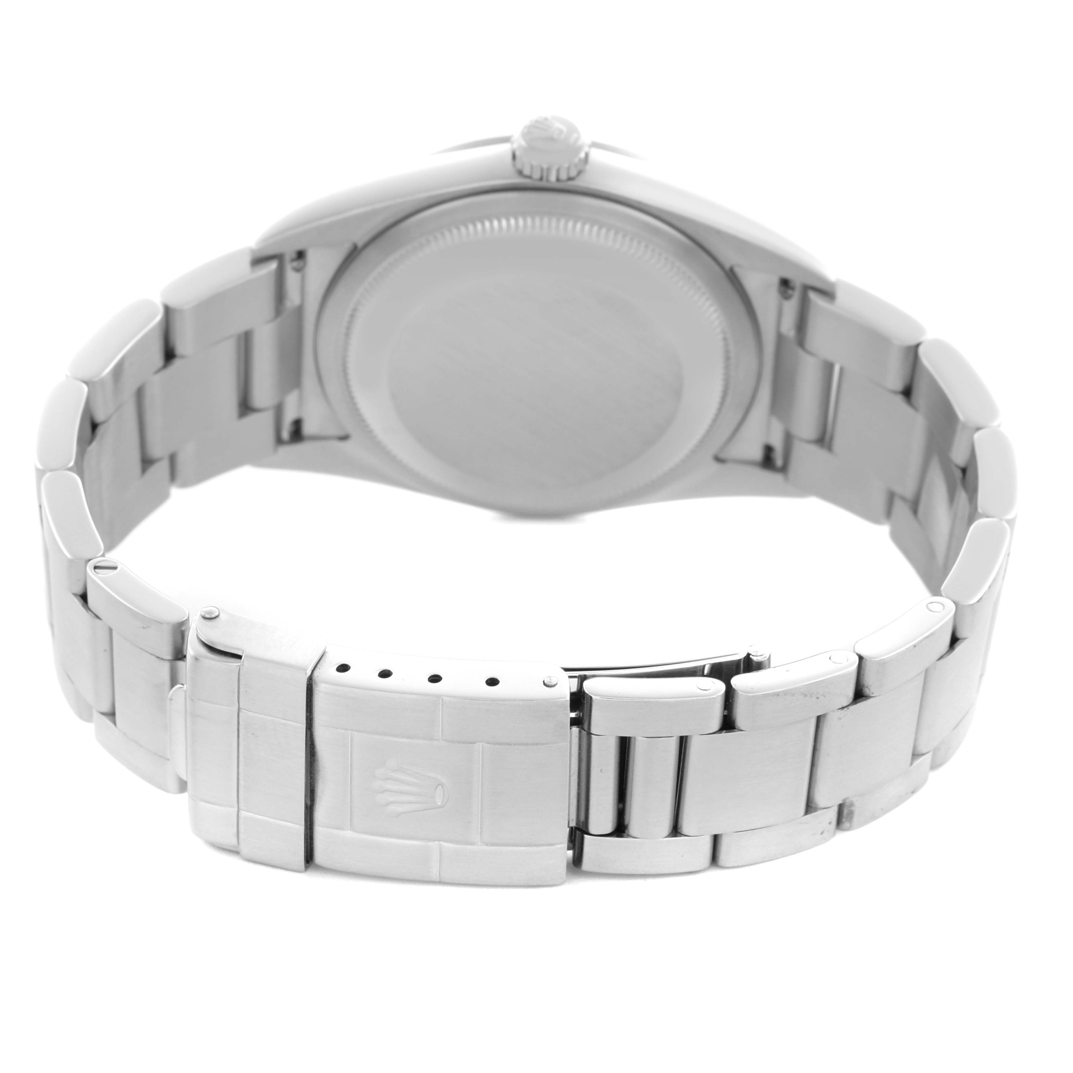 The image shows the back of a Rolex Explorer 114270 Men
s Stainless Steel Black Dial 114270 Men
s Stainless Steel Black Dial watch, focusing on the case back and bracelet with the clasp visible.