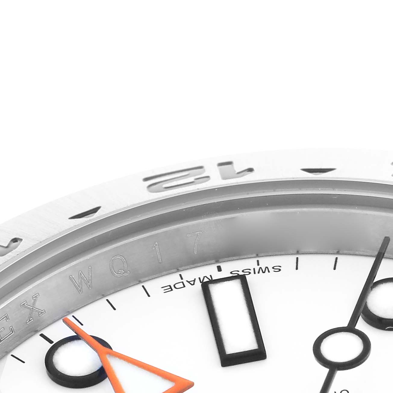The image shows a close-up of the dial and bezel edge of a Rolex Explorer 216570 Men
s Stainless Steel White Dial 216570 Men
s Stainless Steel White Dial watch, highlighting the hour hand and part of the chapter ring.