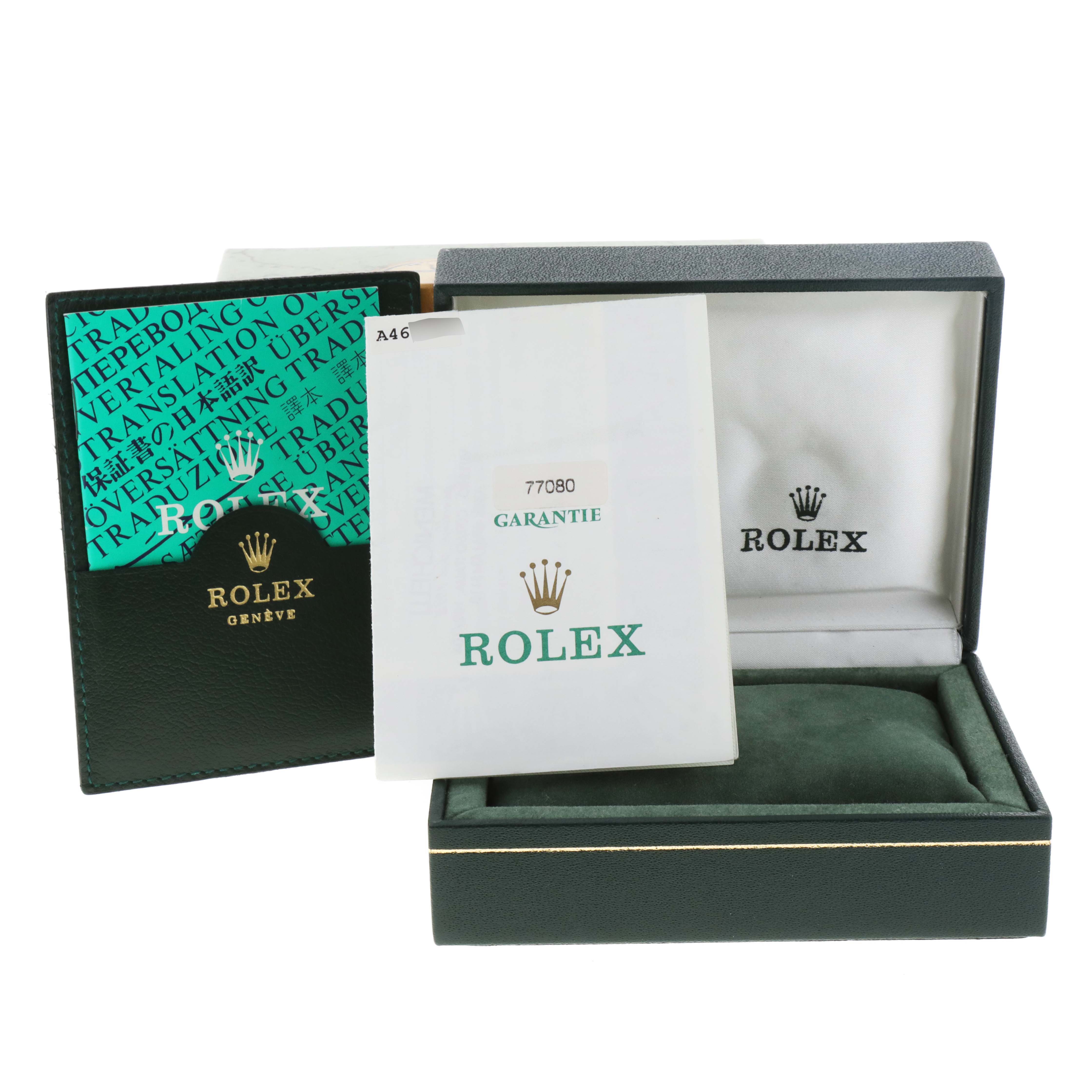 The image shows the packaging, warranty card, and translation booklet for a Mid-Size Rolex watch.